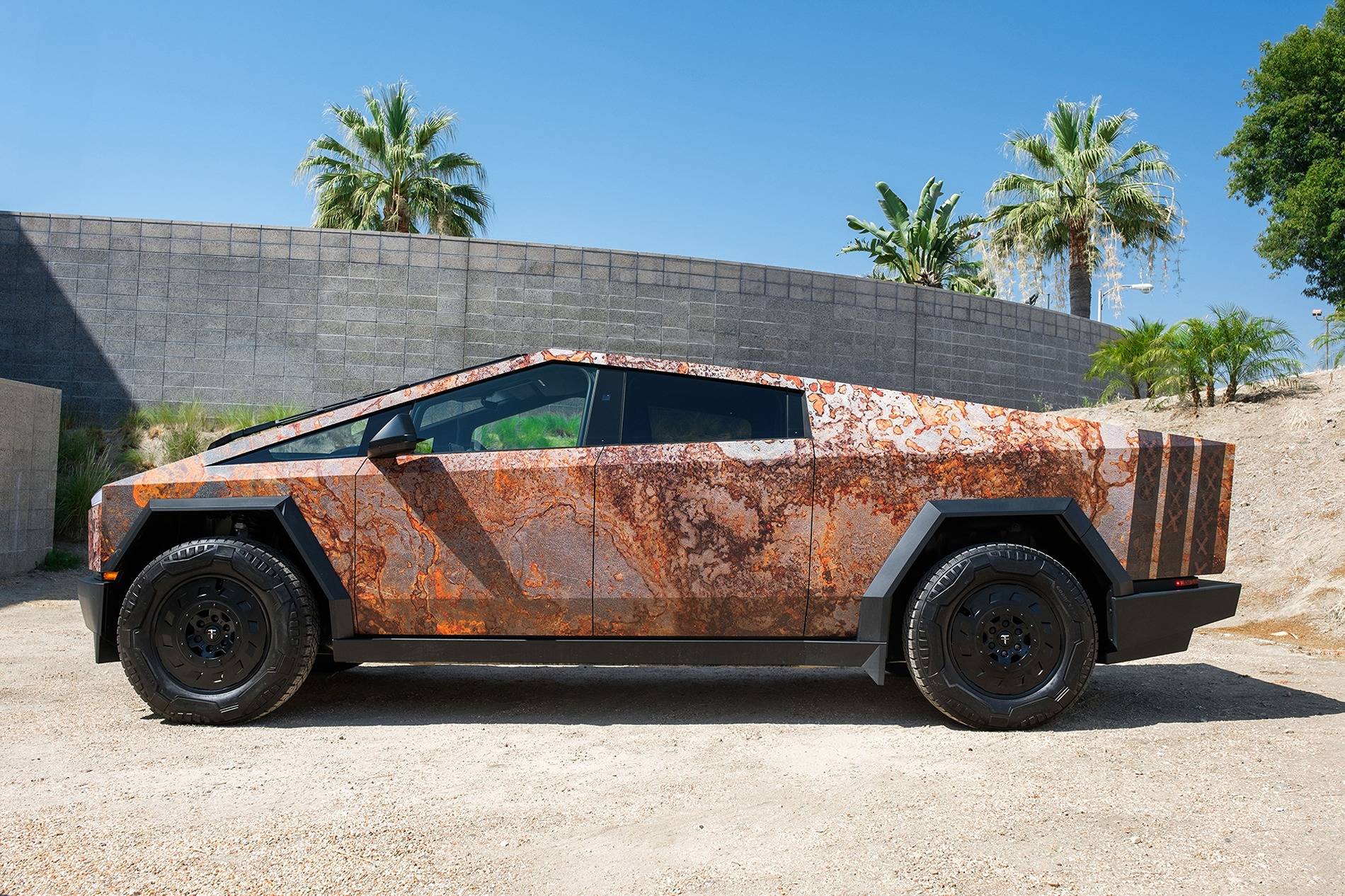 Tesla Cybertruck May the Force be with you! Custom printed Star Wars x Rust themed Cybertruck wrap by T Sportline star-wars-inspired-rust-wookie-power-tesla-cybertruck-tct-20-inch-wheels-satin-black-1920-2