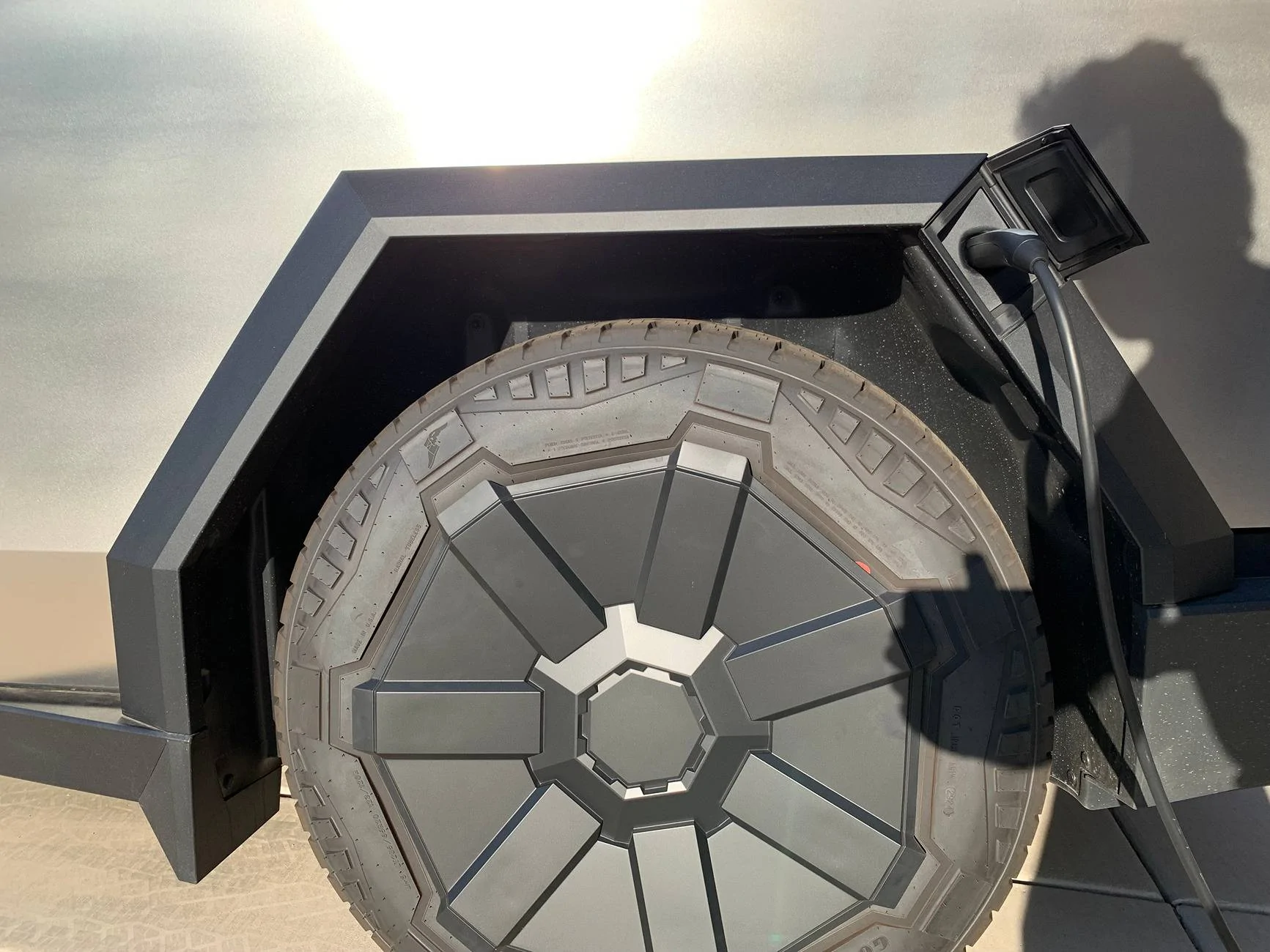 Tesla Cybertruck New Wheel Cover still rubs tire sidewalls -- check your Cybertruck IMG_3272