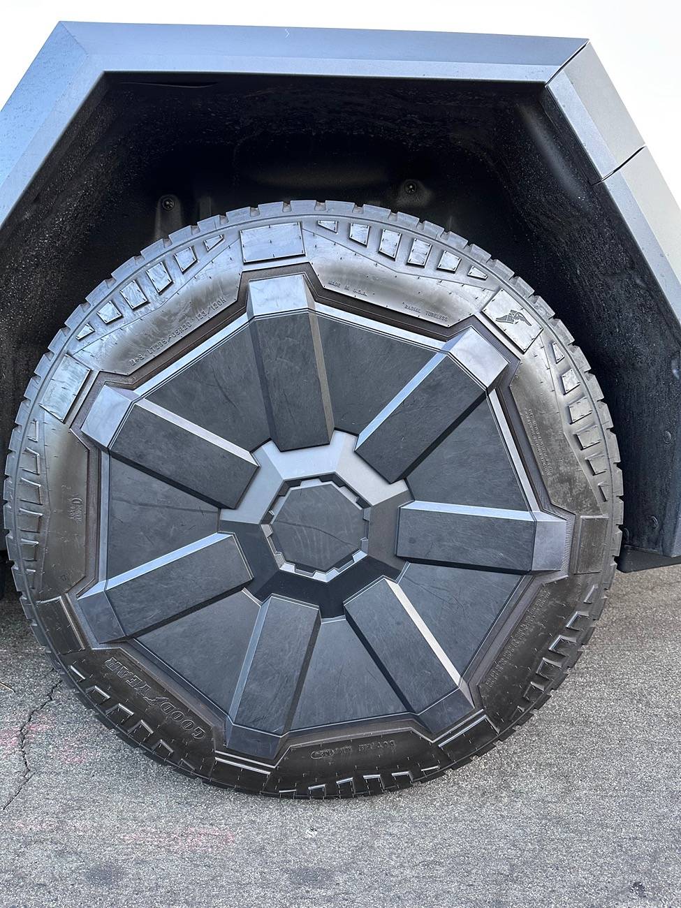 Tesla Cybertruck New Wheel Cover still rubs tire sidewalls -- check your Cybertruck IMG_6127