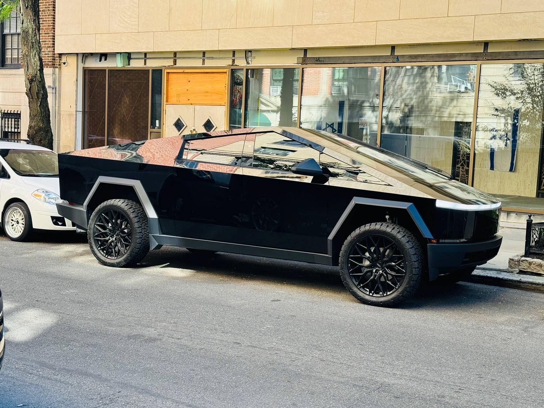 Tesla Cybertruck Gloss Black Wrap with 24" Vossen Wheels, doing truck hauling work IMG_3799