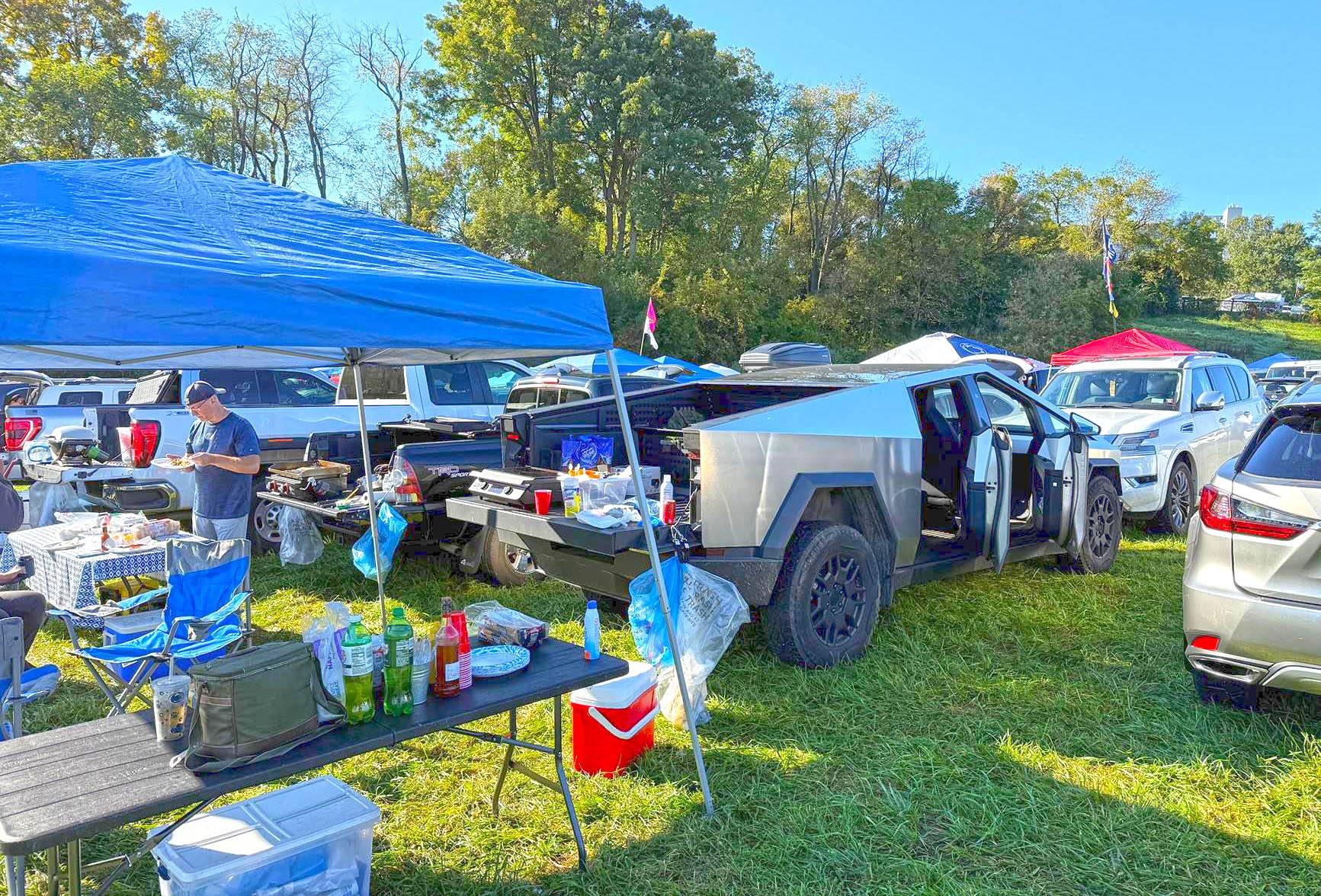 Tesla Cybertruck 308 miles on single charge, Football tailgating and more football tailgating cybertruck