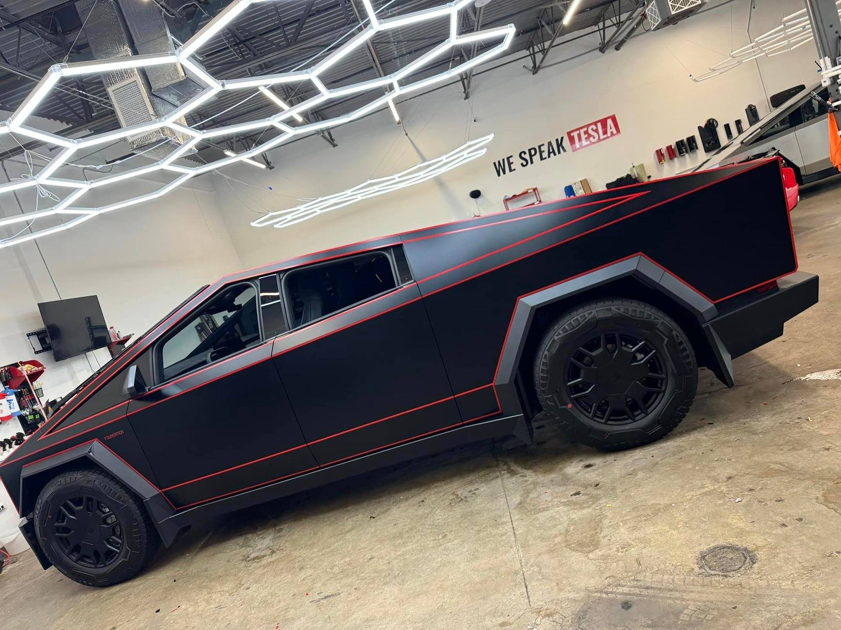 Tesla Cybertruck Matte Black PPF + Red Vinyl Pinstripes on TRON / Batmobile Cybertruck DKD Matte Black PPF + 3M Reflective Red Vinyl Pinstripes on TRON Cybertruck 2