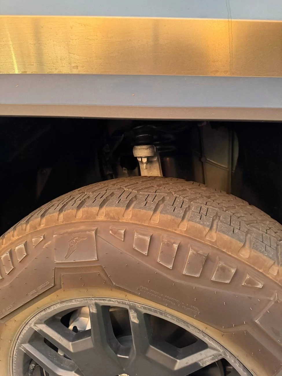 Tesla Cybertruck Is this normal for screw on front wheels? Image_20241011_214322_176