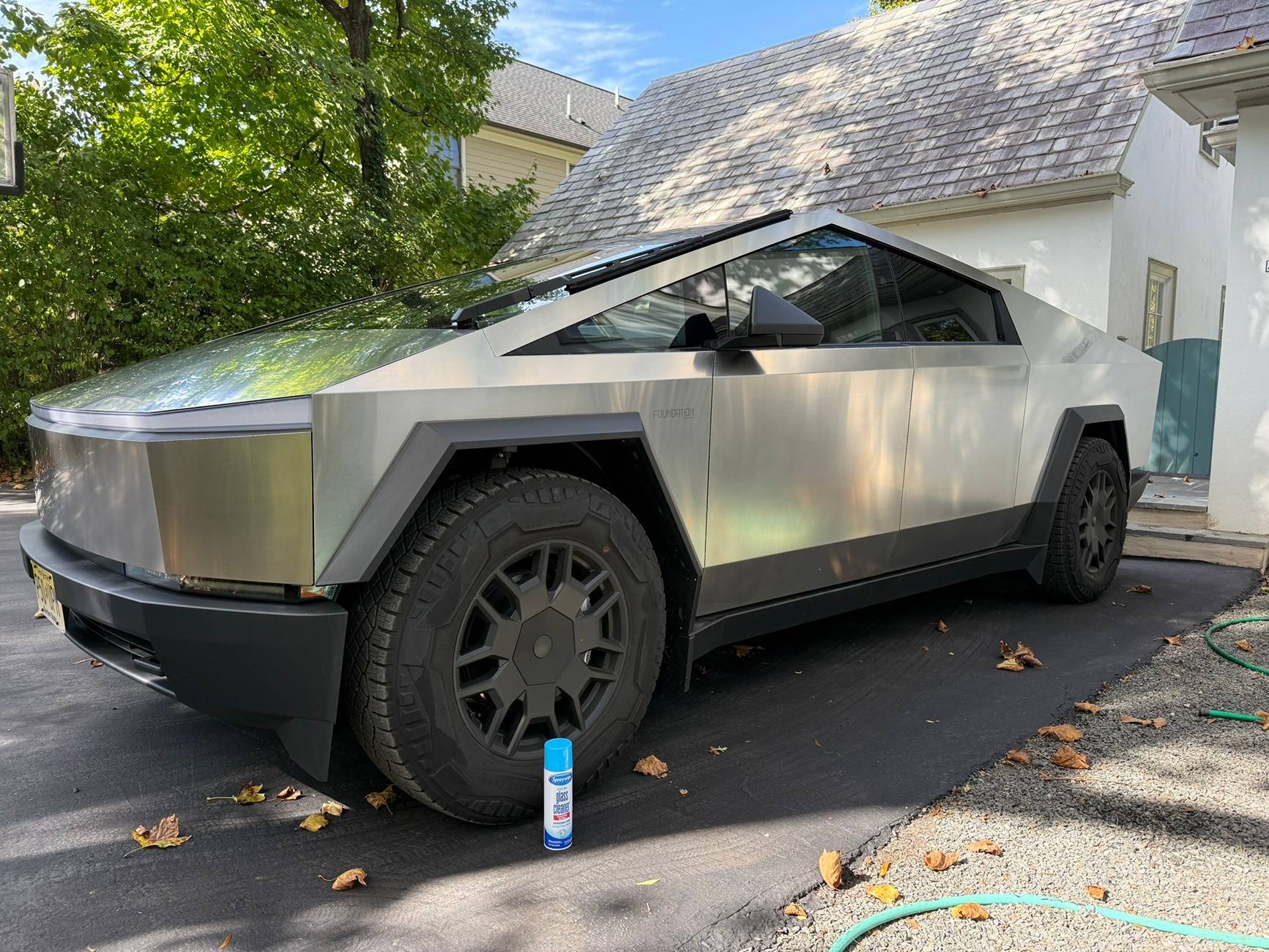 Tesla Cybertruck Sprayway.  That's the post. 1728754507538-w5