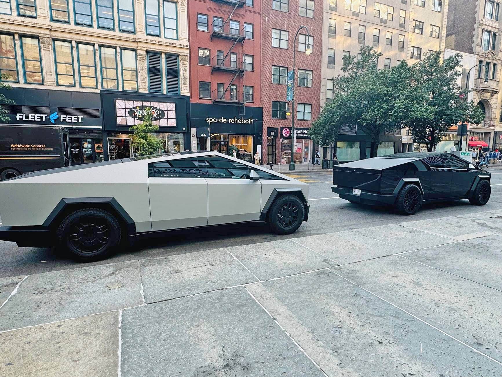 Tesla Cybertruck Gloss Black Wrap with 24" Vossen Wheels, doing truck hauling work IMG_3860