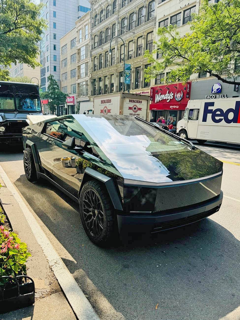 Tesla Cybertruck Gloss Black Wrap with 24" Vossen Wheels, doing truck hauling work IMG_3840 (1)