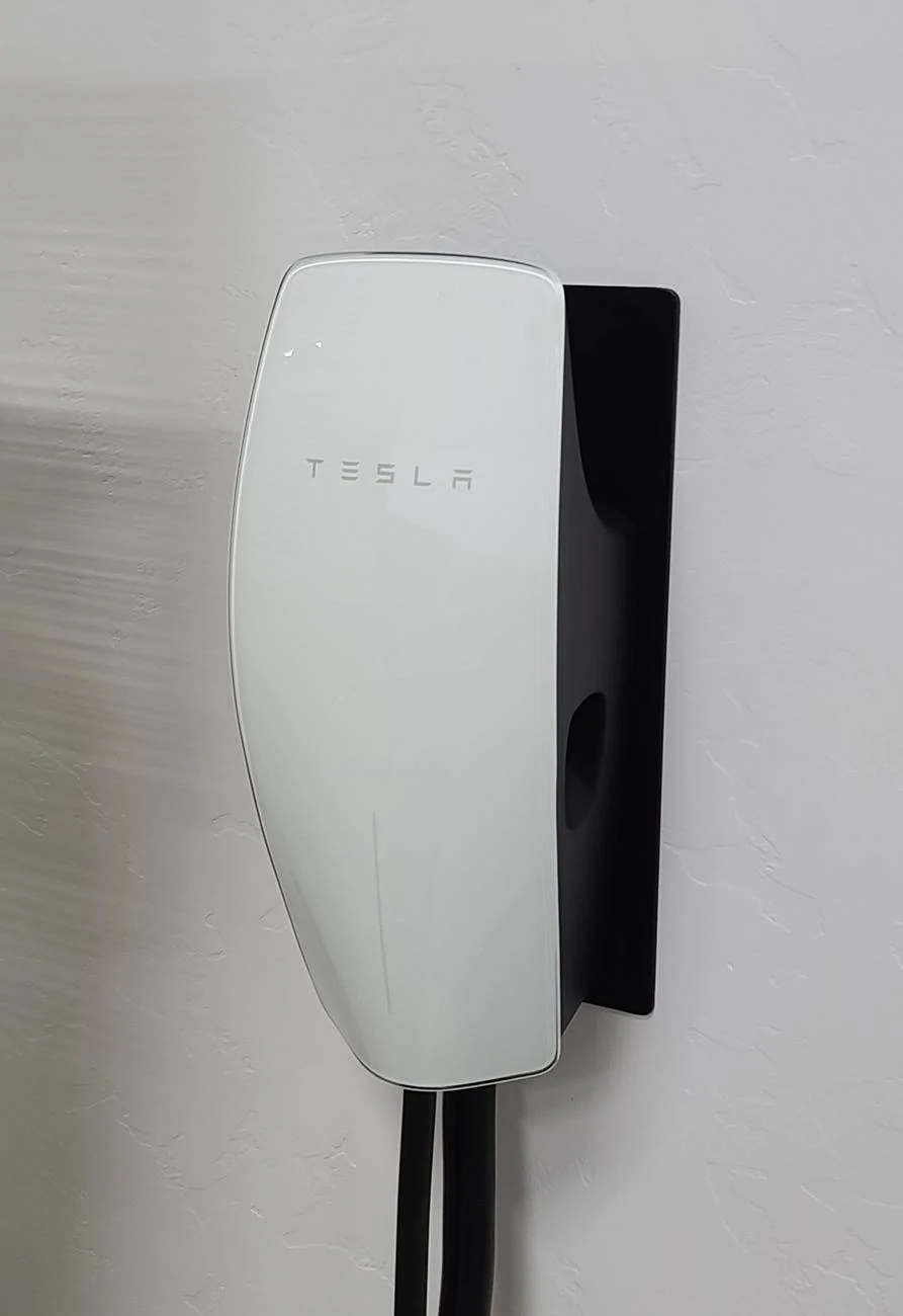Tesla Cybertruck Any accessory to keep docked charging cable (Tesla home charger) from rubbing against garage wall? 20241014_110119