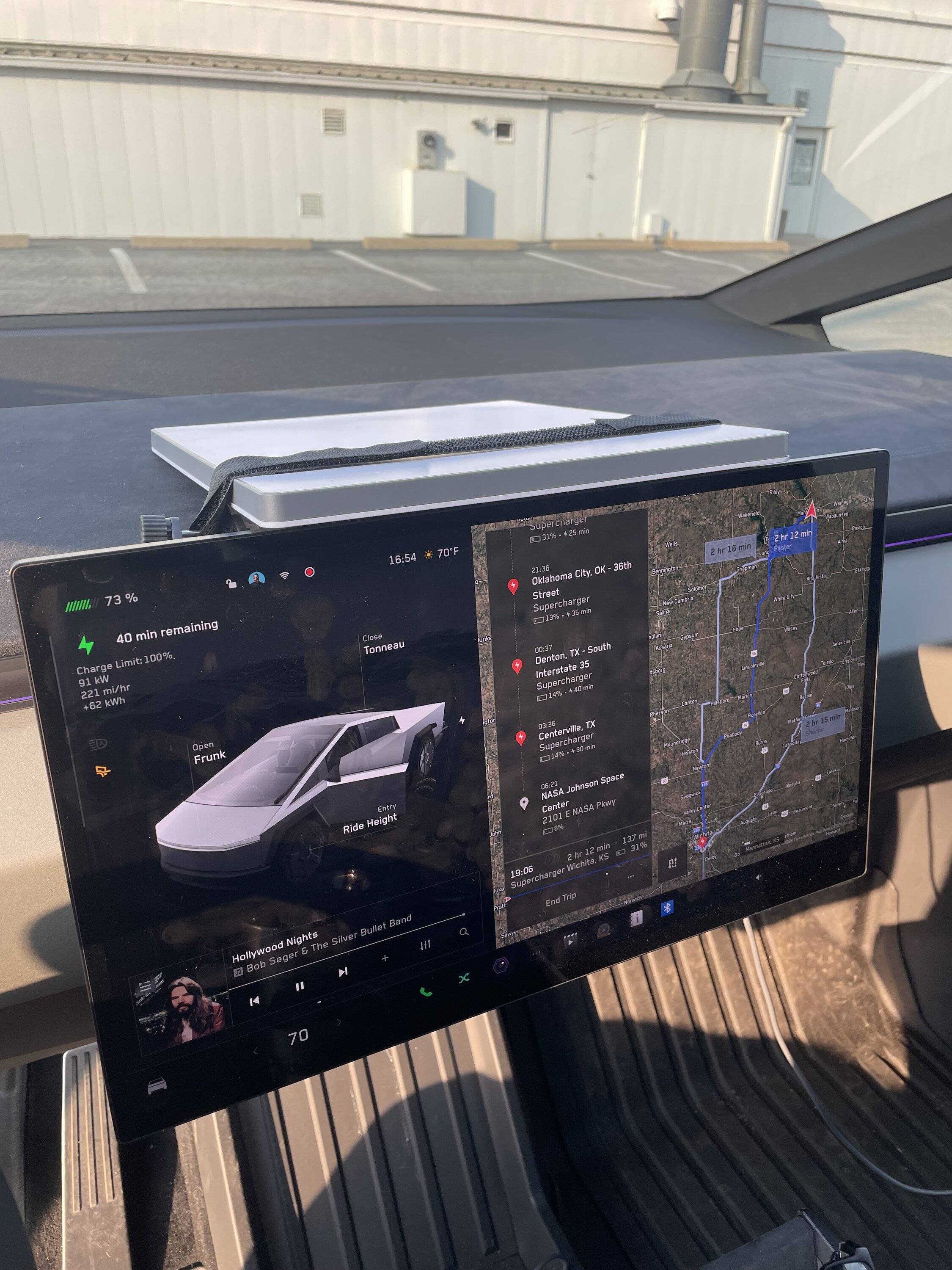Tesla Cybertruck Starlink mini mount strapped down behind display screen — LATEST on what is working for me on my biz road trip IMG_1467
