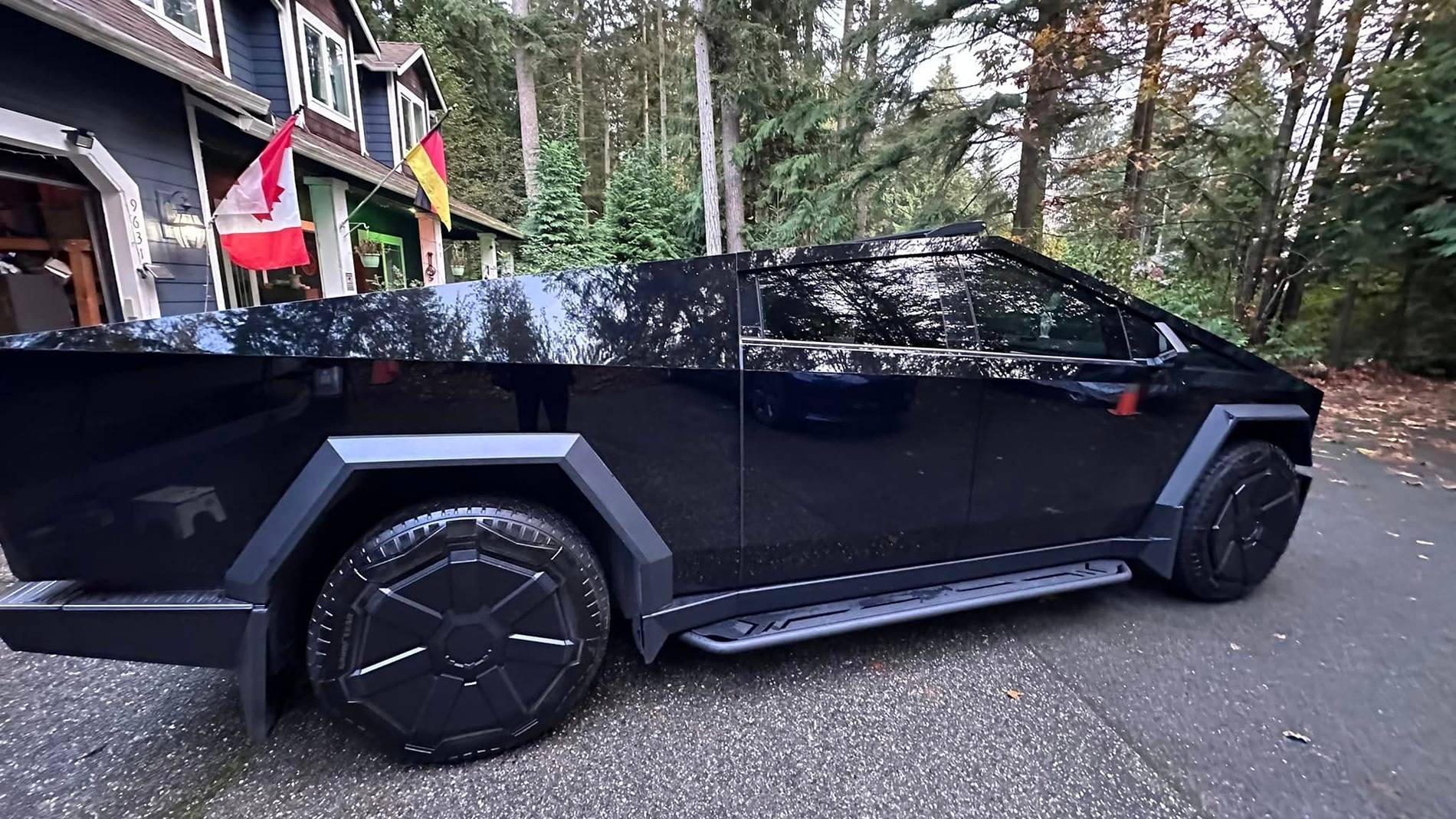 Tesla Cybertruck BLACK Vinyl Wrap & PPF Cybertruck -- Photos & Videos gloss black tesla cybertruck running boards wheel covers