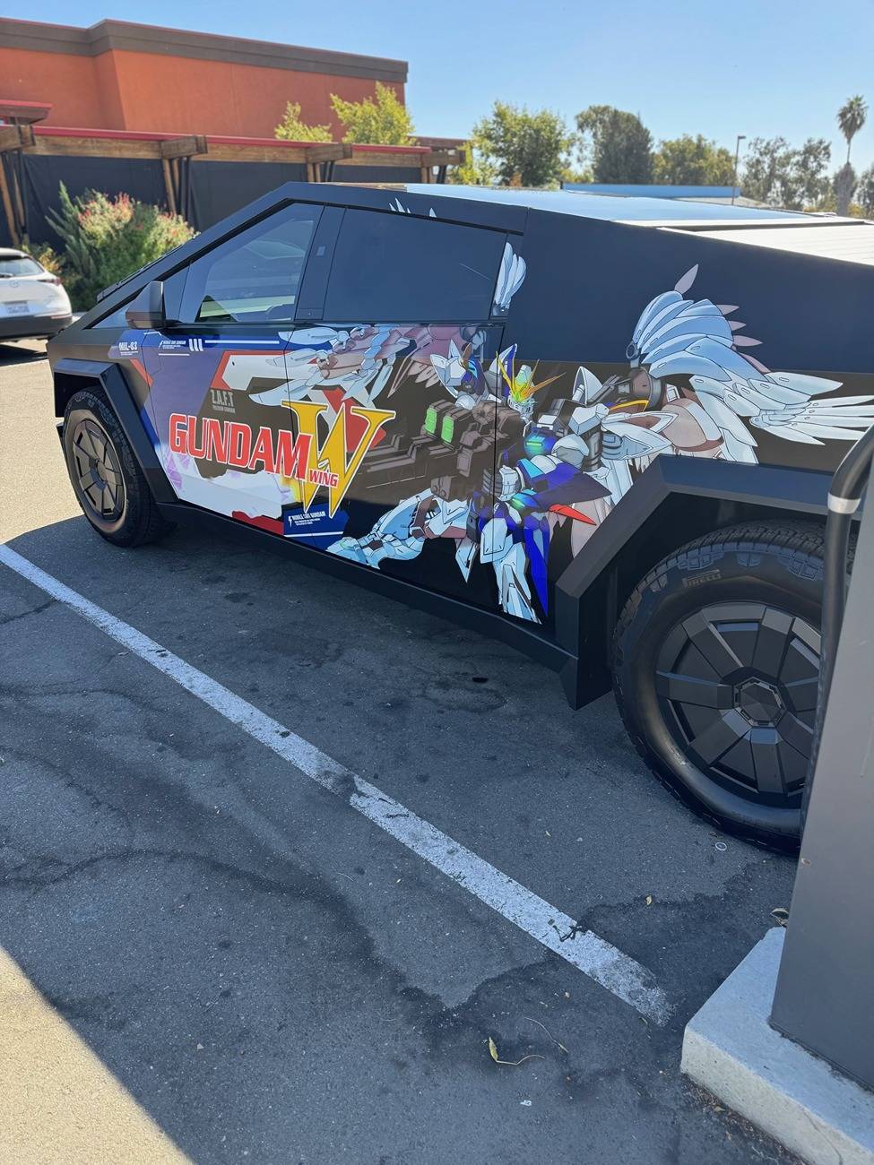 Tesla Cybertruck CUSTOM GRAPHICS / DESIGN / THEME Vinyl Wrap & PPF Cybertruck -- Photos & Videos cybertruck wing side rear view