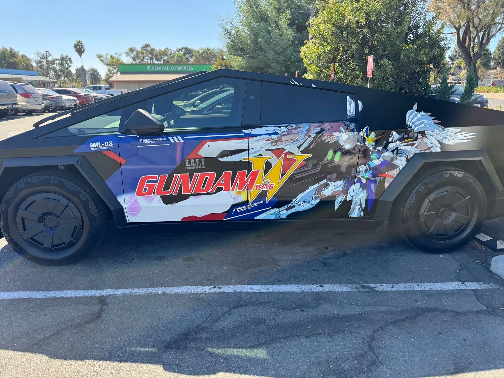 Tesla Cybertruck CUSTOM GRAPHICS / DESIGN / THEME Vinyl Wrap & PPF Cybertruck -- Photos & Videos cybertruck wing side