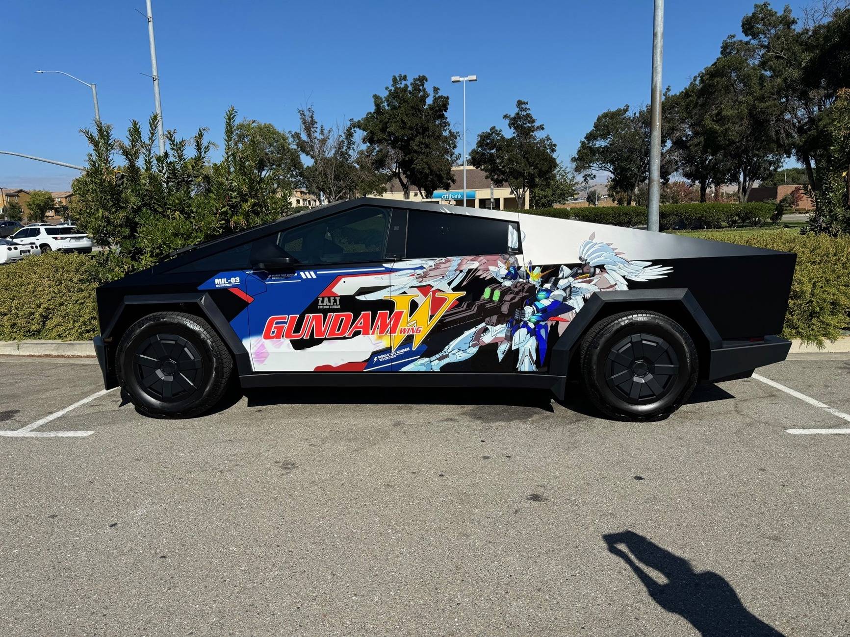Tesla Cybertruck CUSTOM GRAPHICS / DESIGN / THEME Vinyl Wrap & PPF Cybertruck -- Photos & Videos cybertruck wing side full view