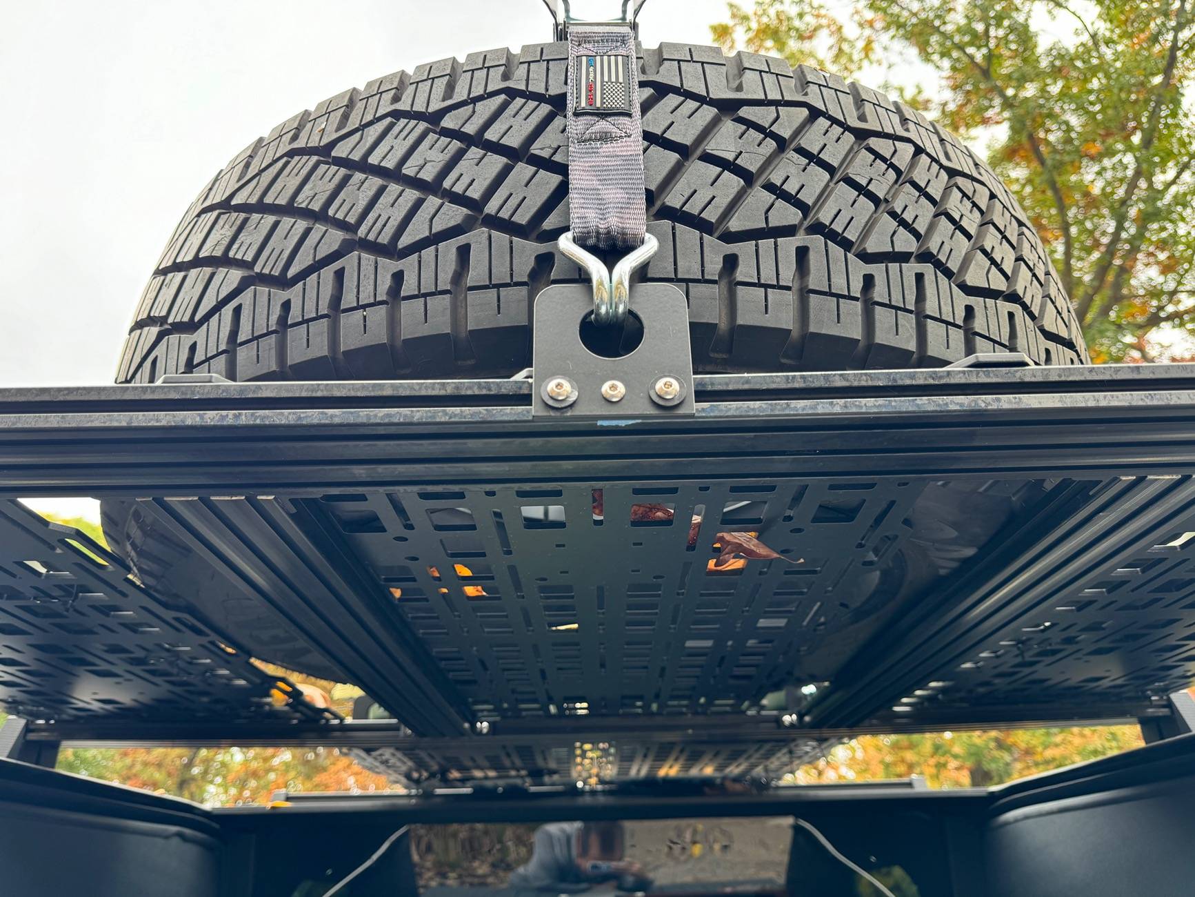 Tesla Cybertruck Customized roof rack installed with unique spare tire placement IMG_4636