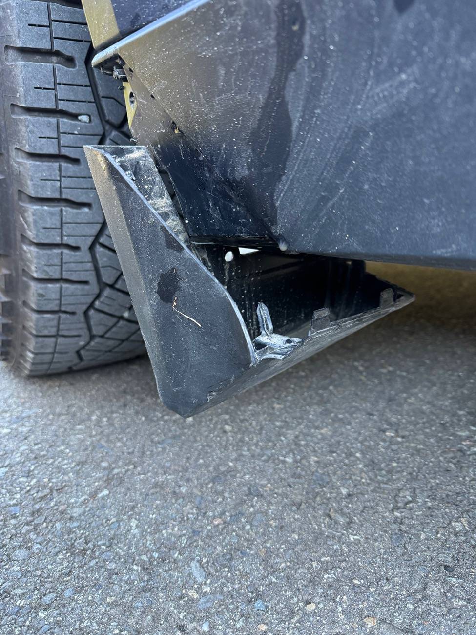 Tesla Cybertruck Road Damage to Rocker Fairing IMG_0265