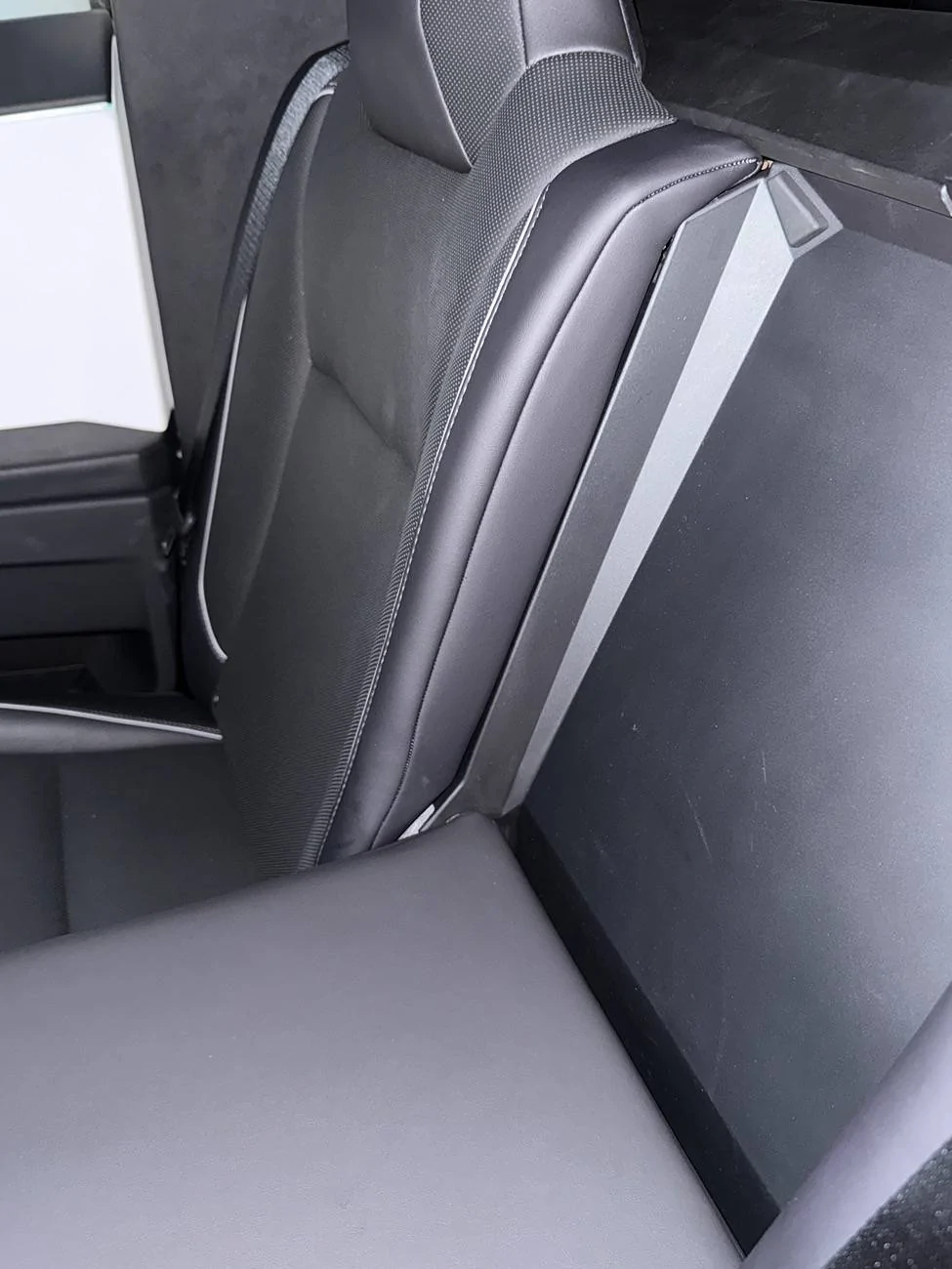 Tesla Cybertruck Rear Seats Appear Loose and Exposed Hardware Behind Them? IMG_5757