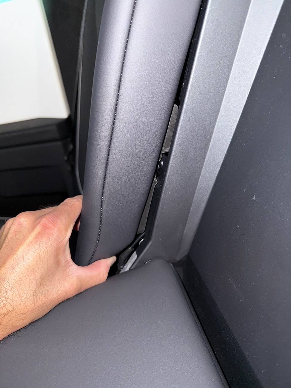 Tesla Cybertruck Rear Seats Appear Loose and Exposed Hardware Behind Them? IMG_5758