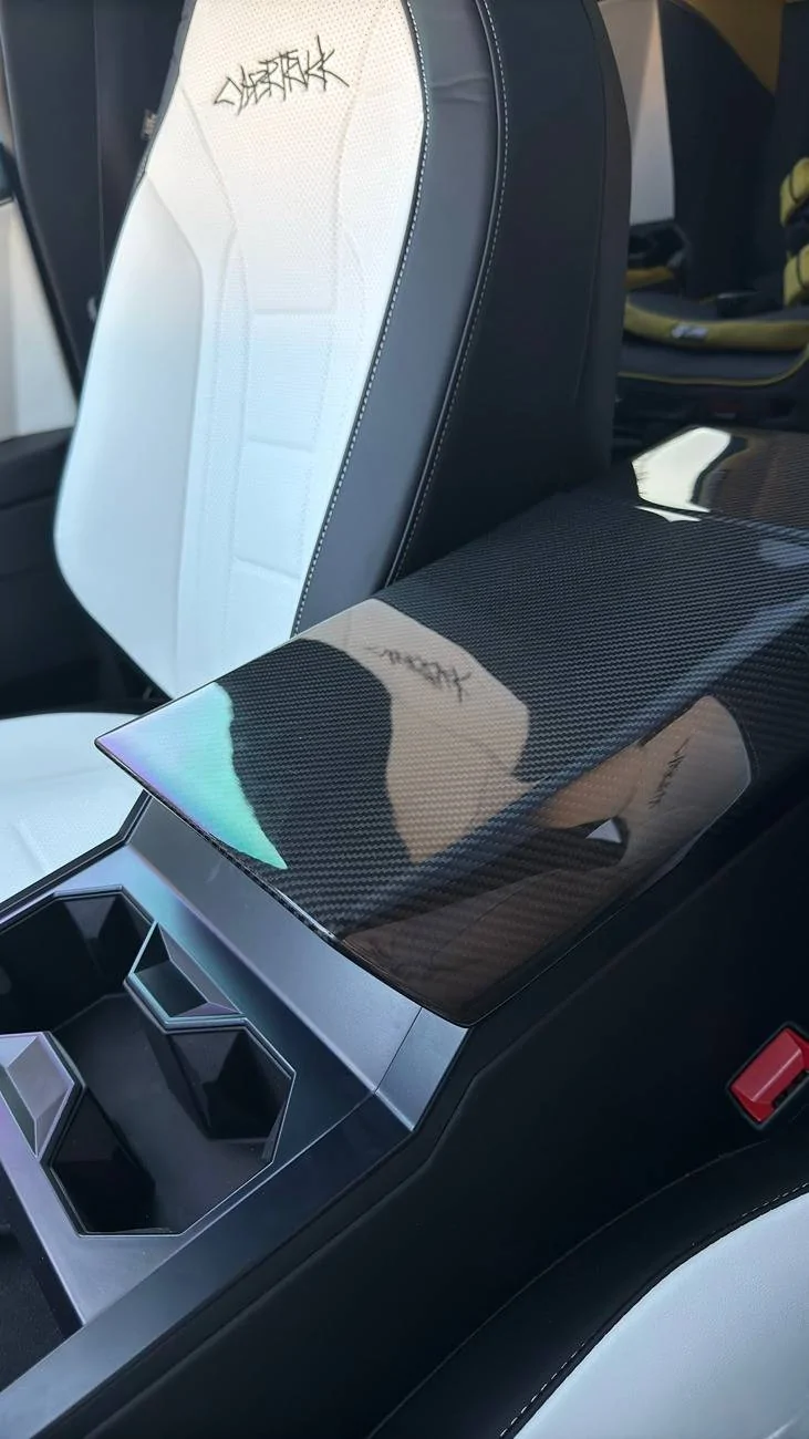 Tesla Cybertruck I upgraded my Cybertruck's Armrest Box, what do you think? IMG_1828.HEIC