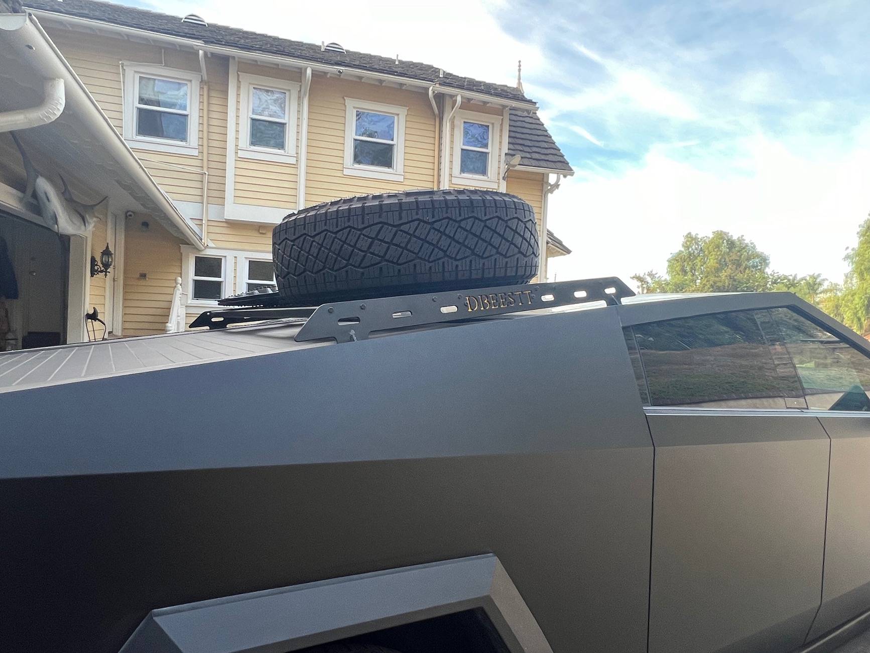 Tesla Cybertruck Customized roof rack installed with unique spare tire placement IMG_4243