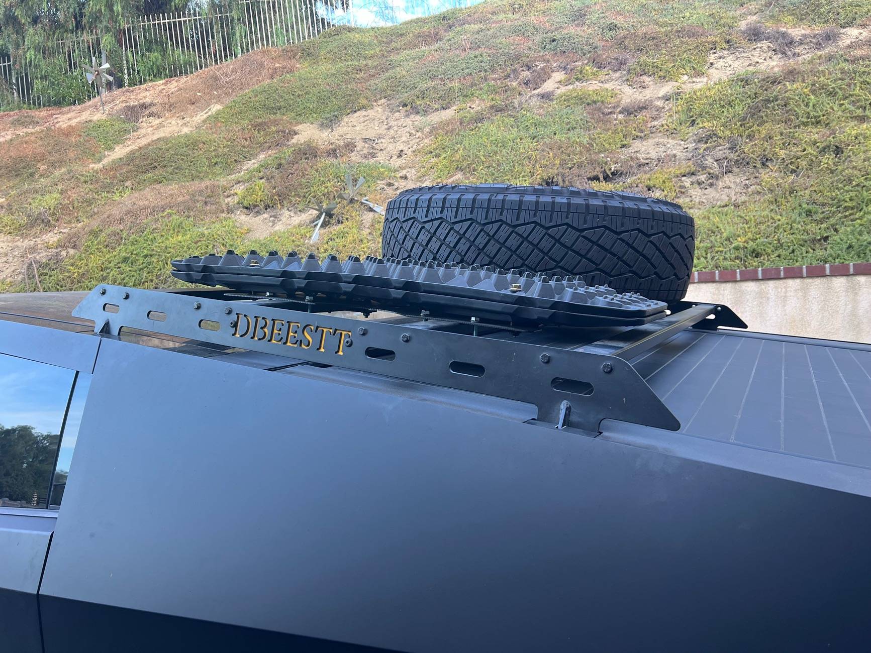 Tesla Cybertruck Customized roof rack installed with unique spare tire placement IMG_4240