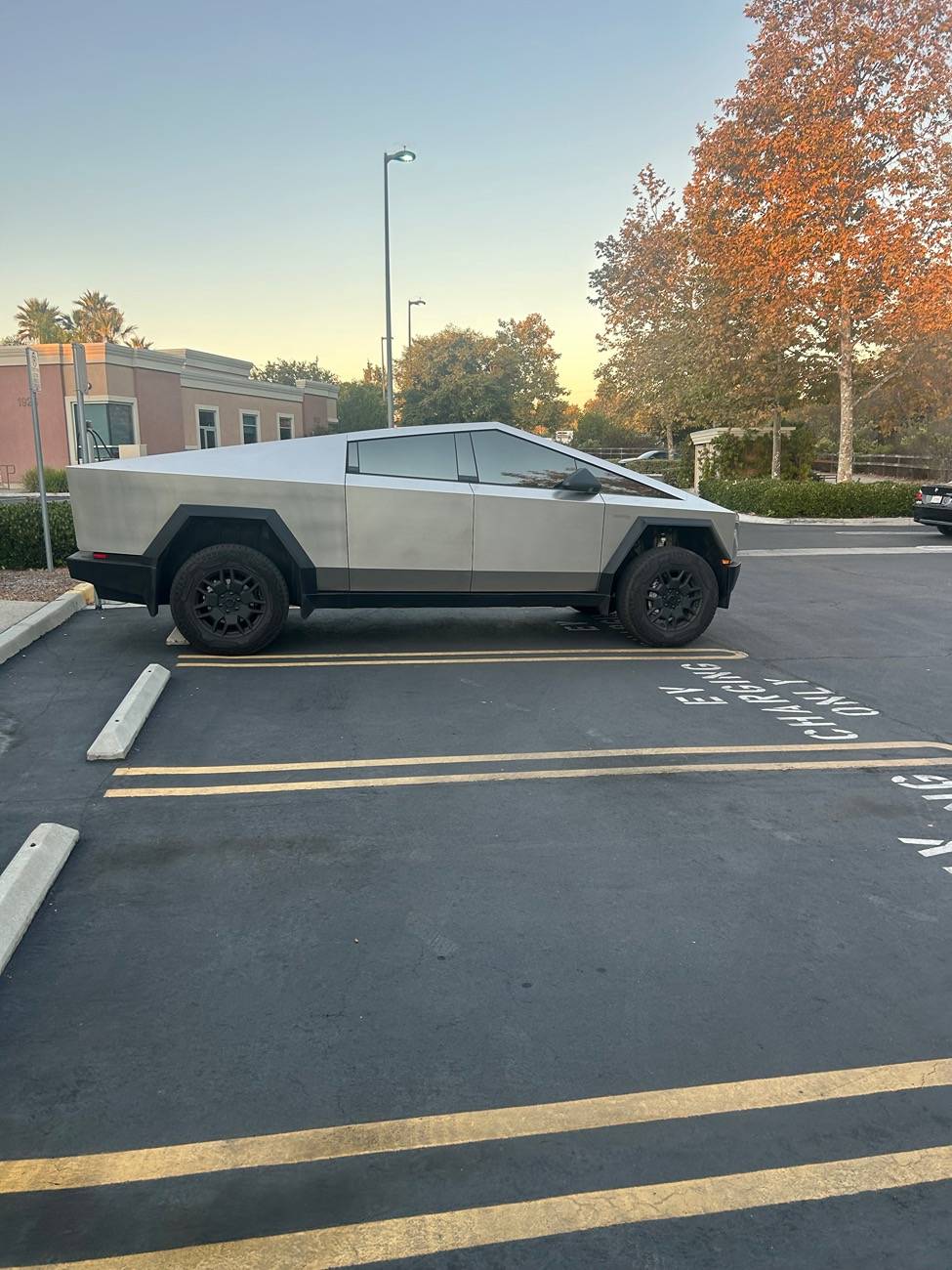 Tesla Cybertruck Stealth mirror tint installed. How long until I get a ticket? IMG_4683