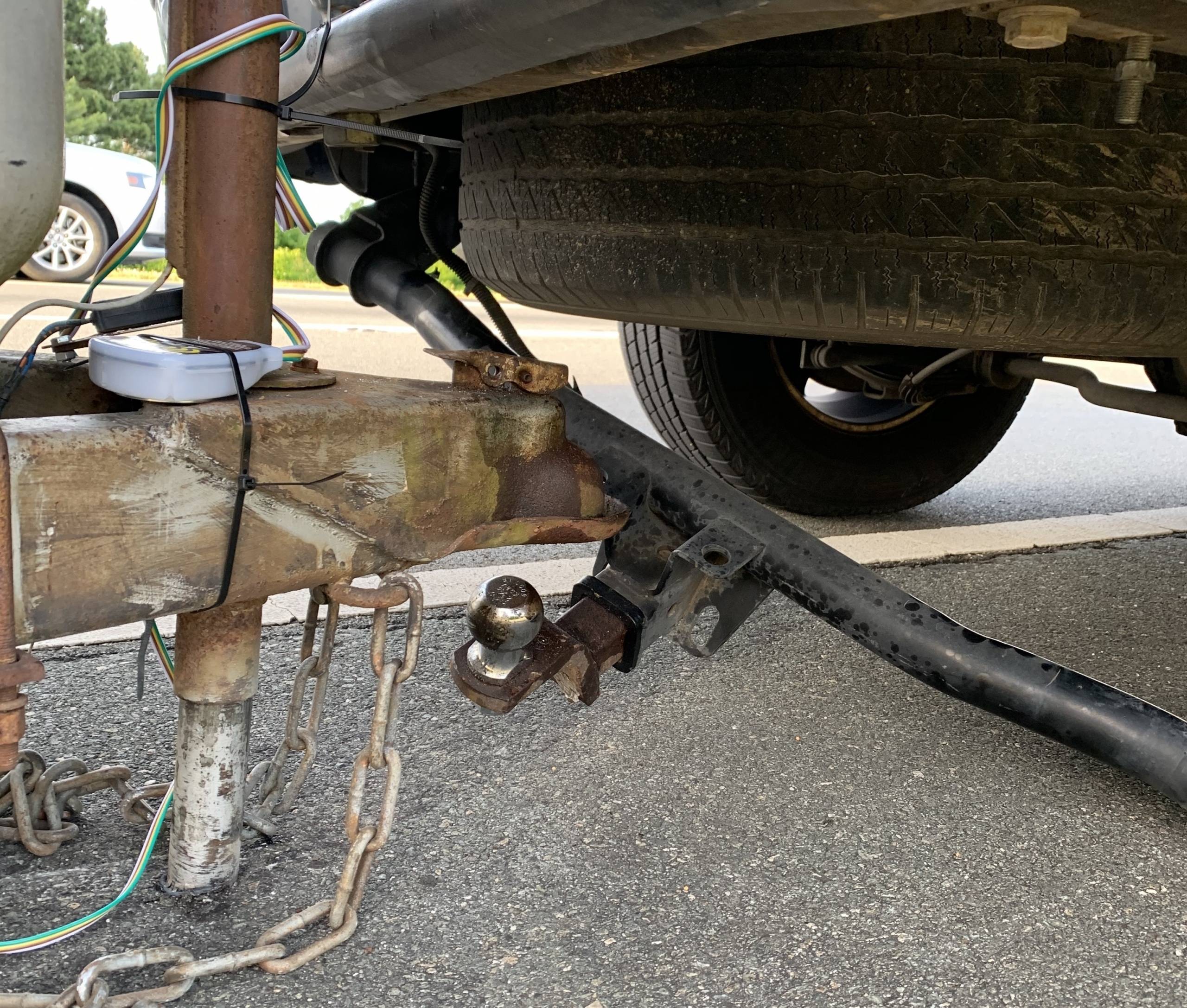 Tesla Cybertruck How concerned should I be about towing ? factory-trailer-hitch-fails-scaled