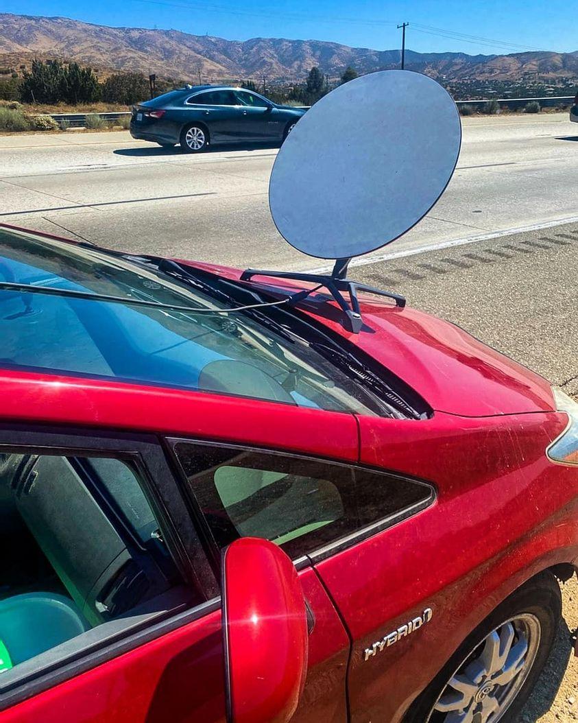 Tesla Cybertruck Toyota Prius Driver Pulled Over for Starlink Dish on the Hood, Surprised _nc_ohc=3PDZrOspG4IAX_9rDmw&_nc_ht=scontent-dfw5-2