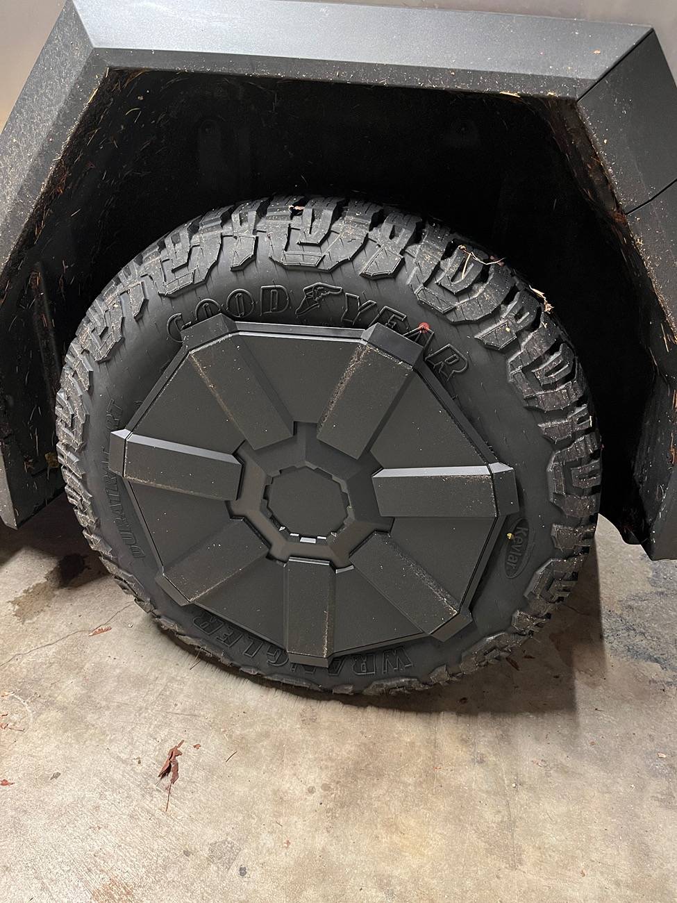 Tesla Cybertruck Tesla OEM winter wheel package and wheel covers installed on Cybertruck IMG_2579