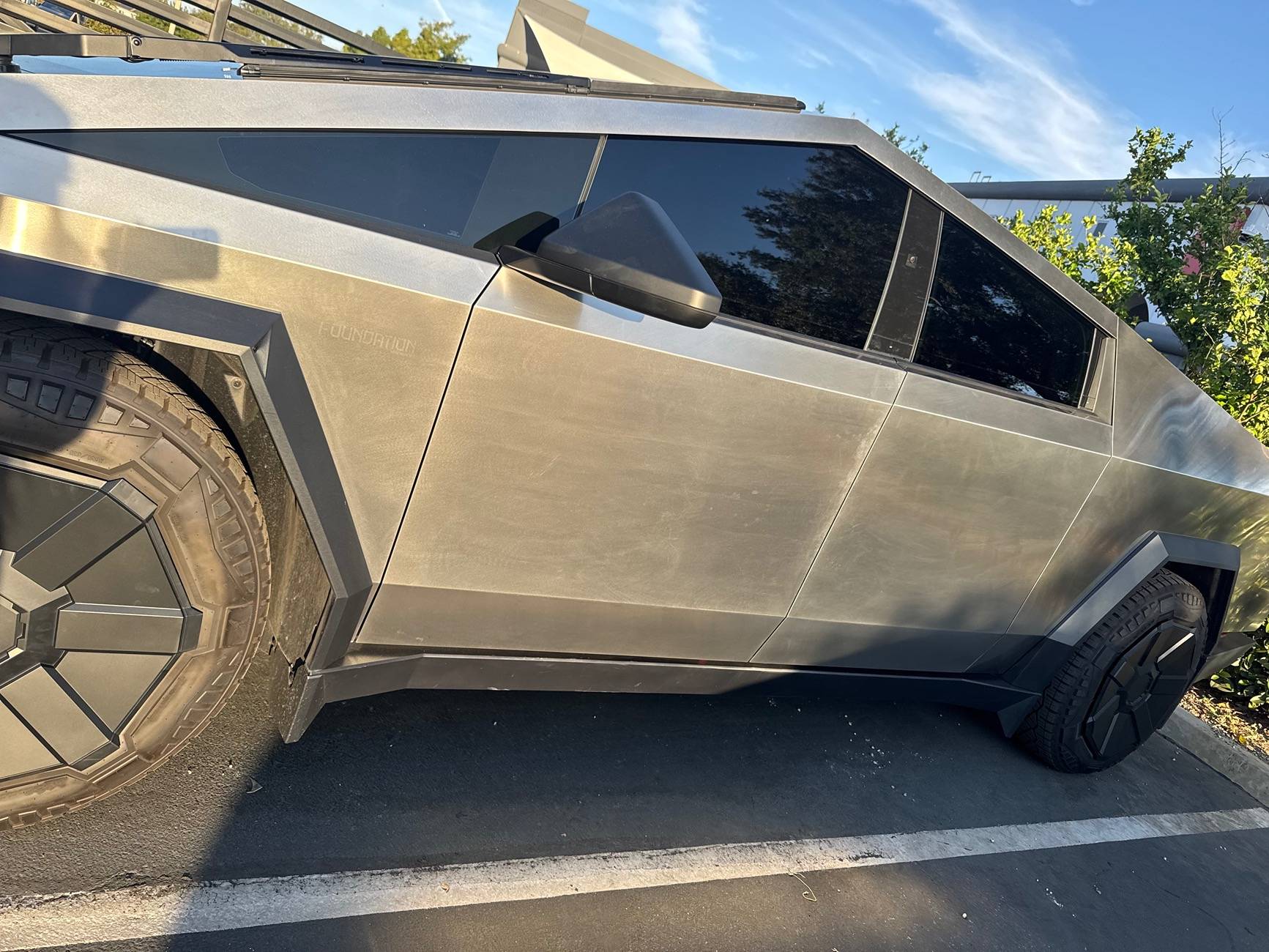 Tesla Cybertruck Cybertruck Service Center Scratches 75038546185__24FFB26C-2A6E-4671-BAF3-861F4A98ABE5