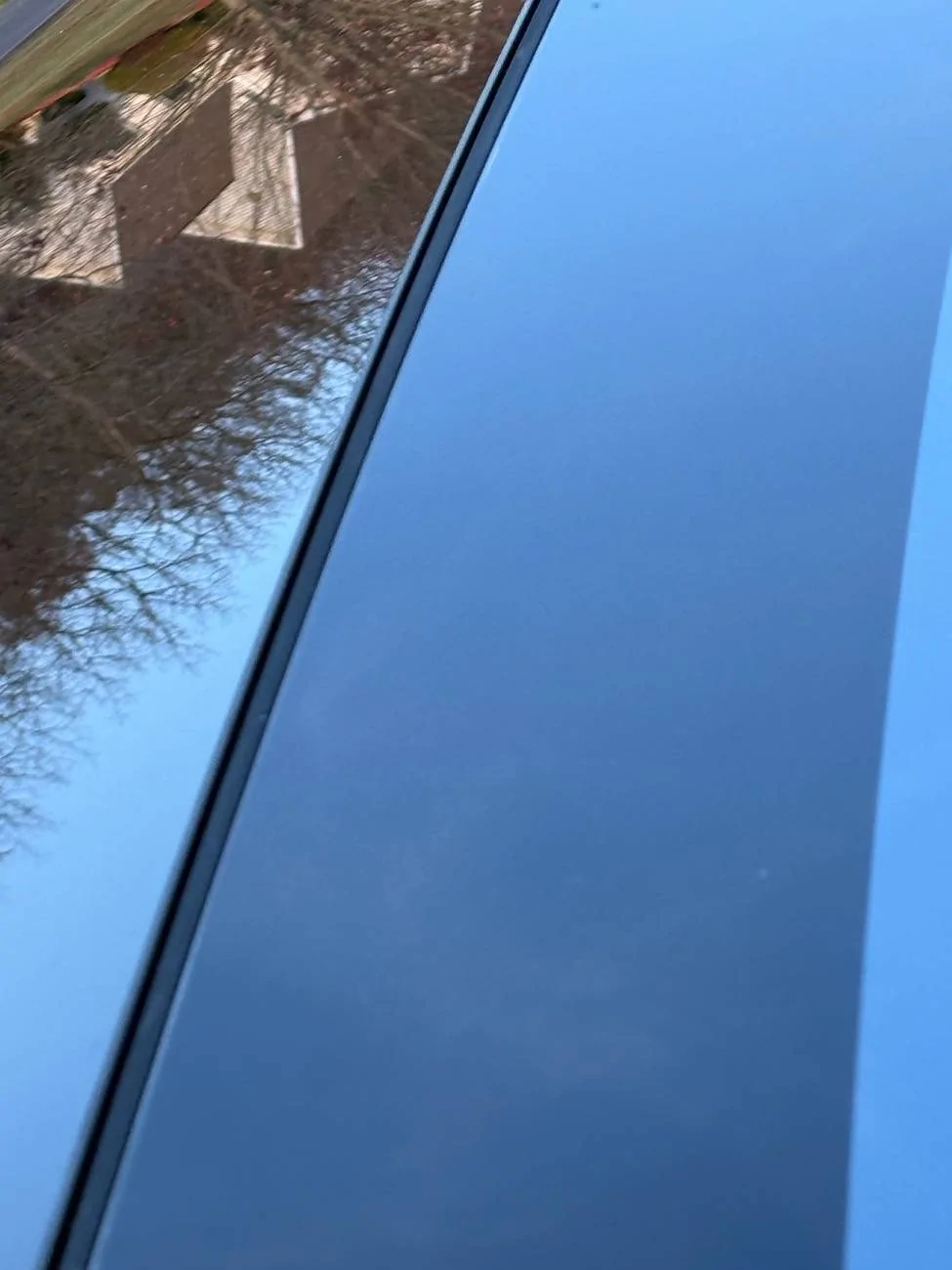 Tesla Cybertruck Wind noise (windshield area) fix? IMG_4152