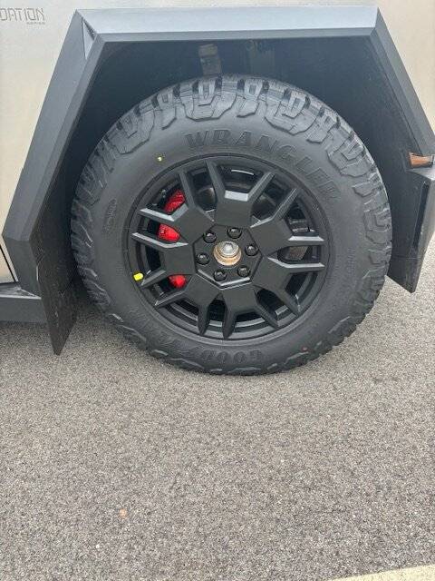 Tesla Cybertruck Tesla OEM winter wheel package and wheel covers installed on Cybertruck IMG_8291
