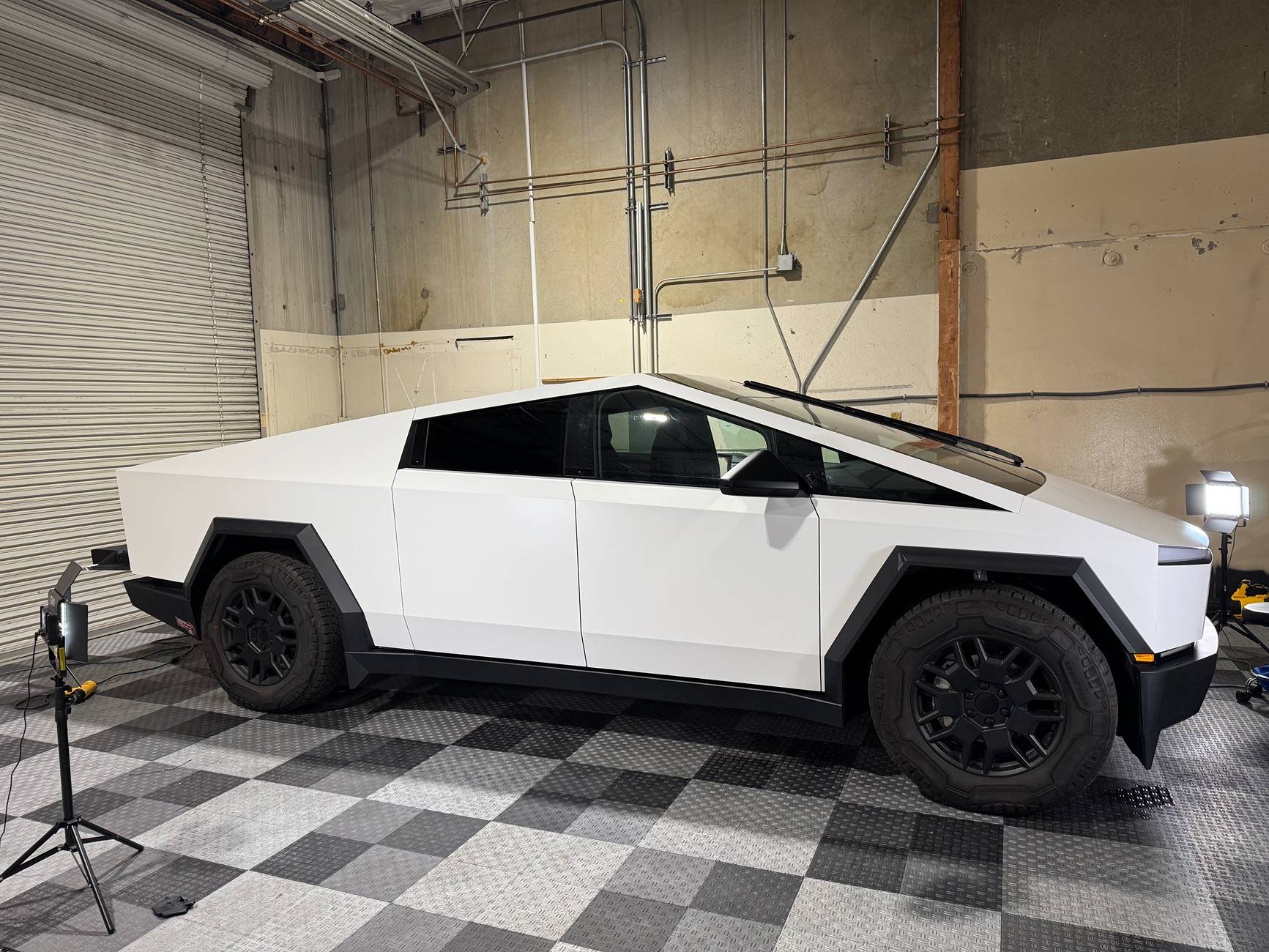 Tesla Cybertruck Cybertruck wrapped in Satin White PPF with satin pillars IMG_2249