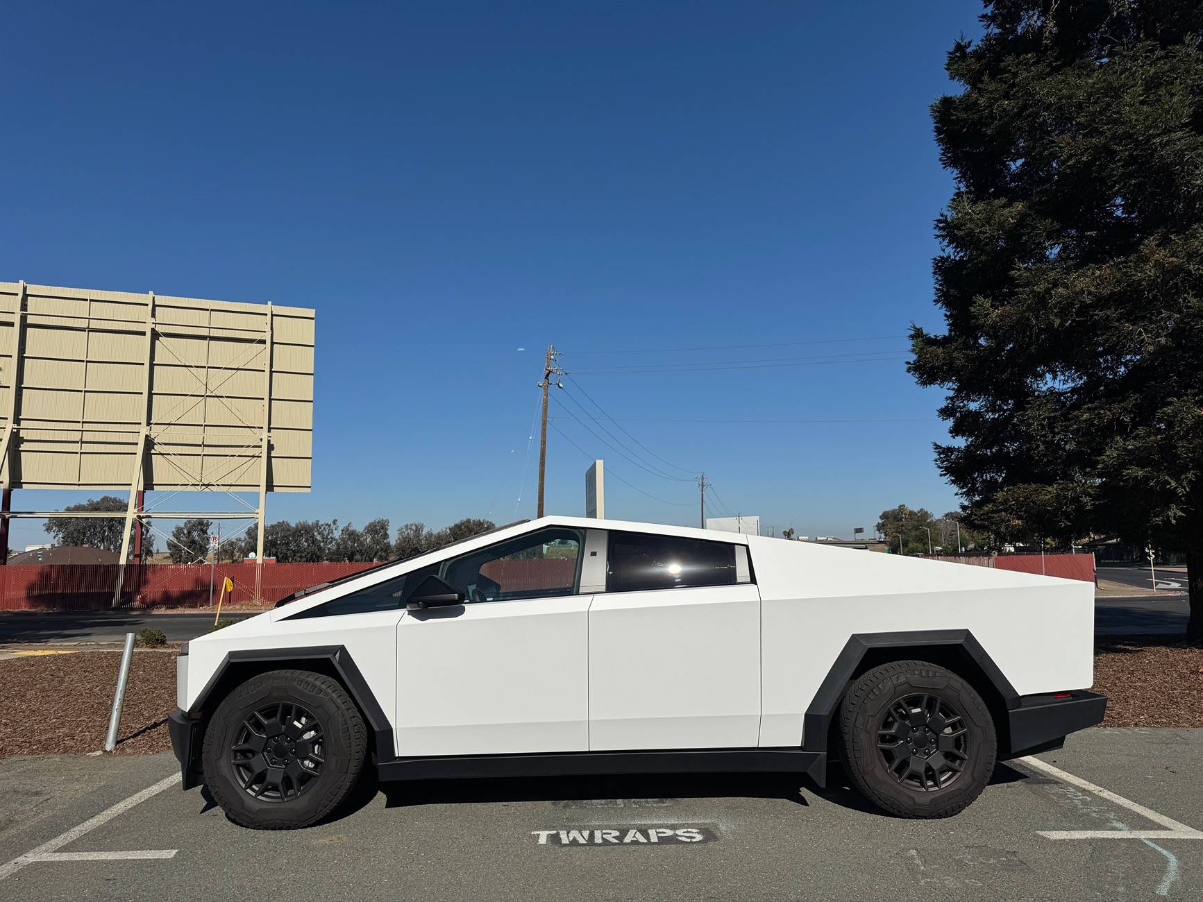 Tesla Cybertruck Cybertruck wrapped in Satin White PPF with satin pillars IMG_2252