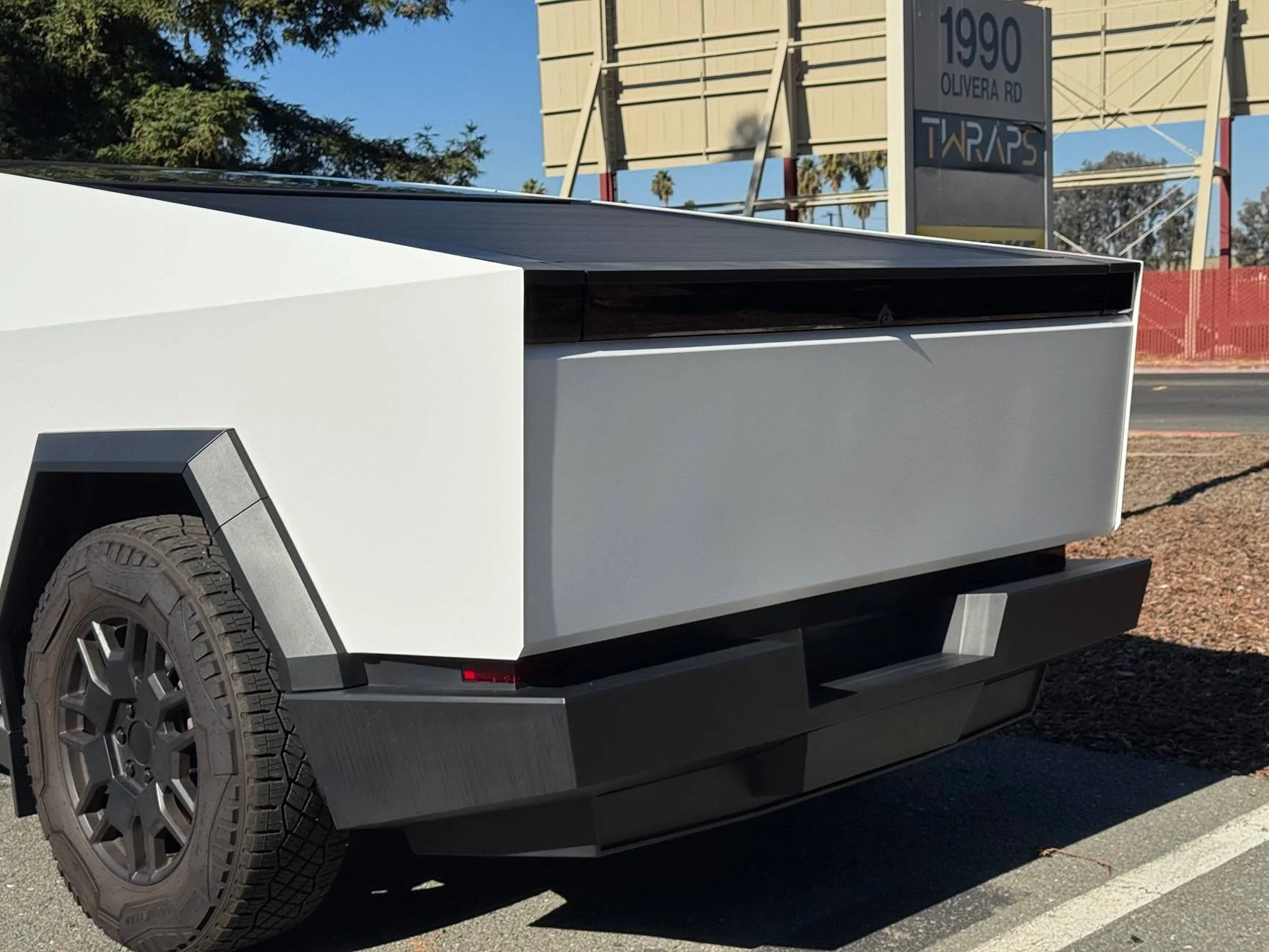 Tesla Cybertruck Cybertruck wrapped in Satin White PPF with satin pillars IMG_2253
