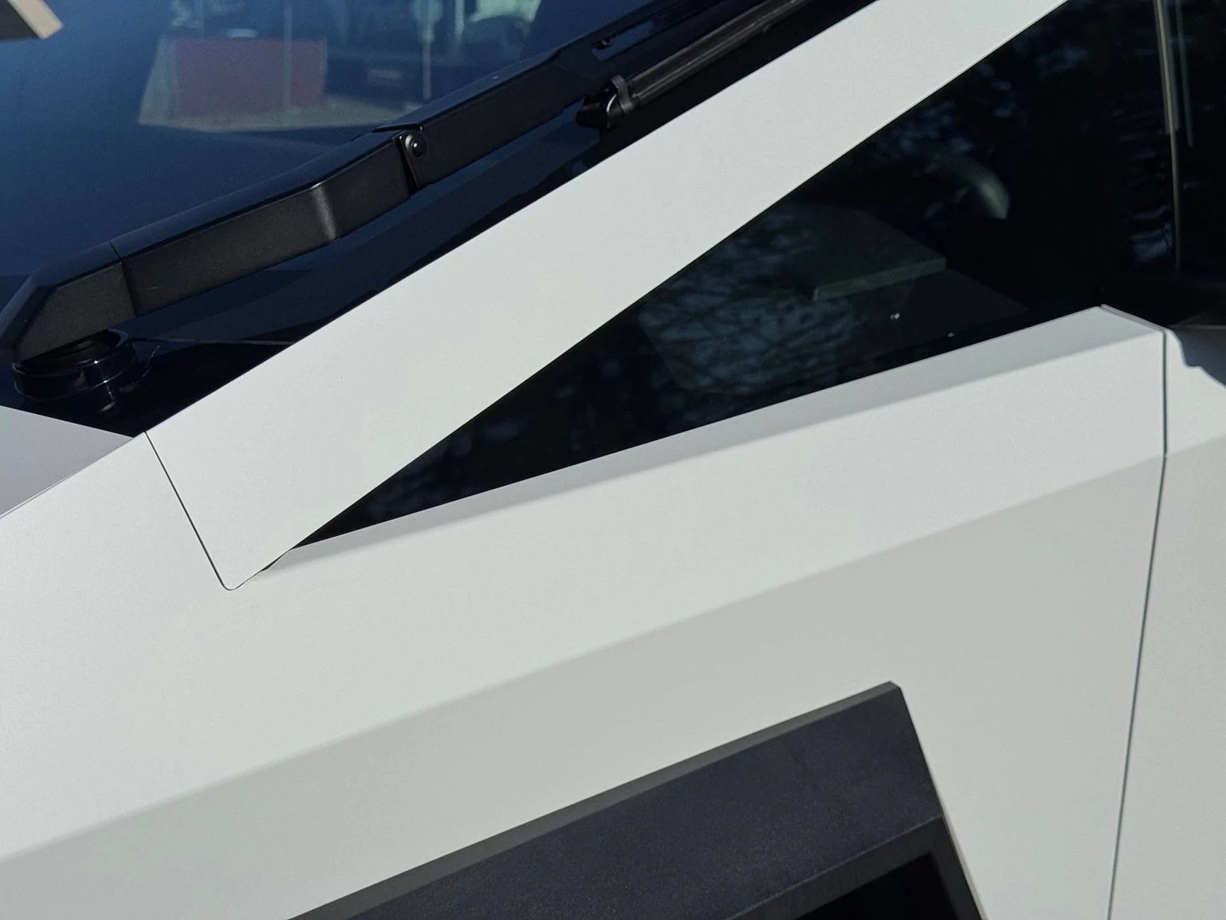 Tesla Cybertruck Cybertruck wrapped in Satin White PPF with satin pillars IMG_2254