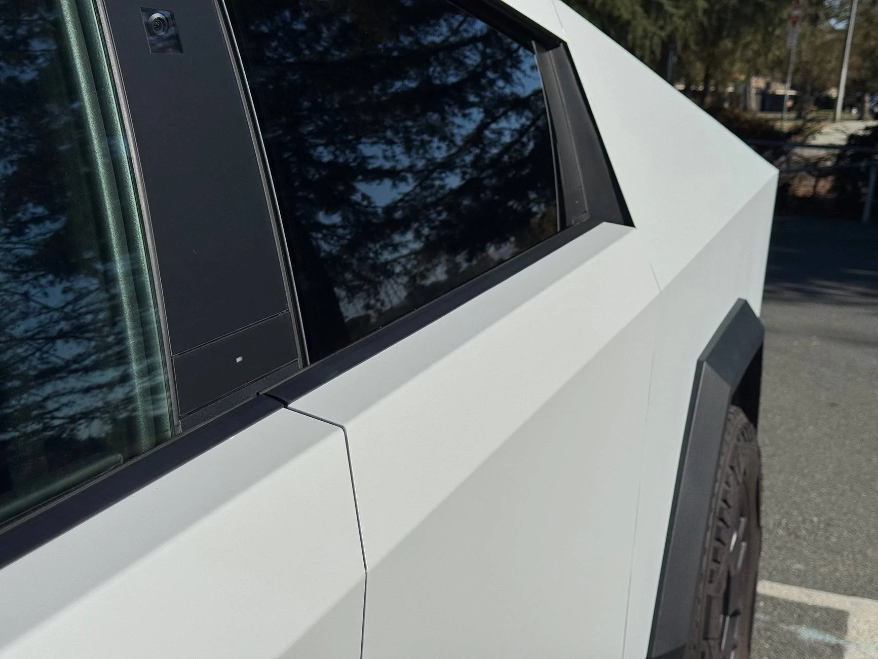 Tesla Cybertruck Cybertruck wrapped in Satin White PPF with satin pillars IMG_2255