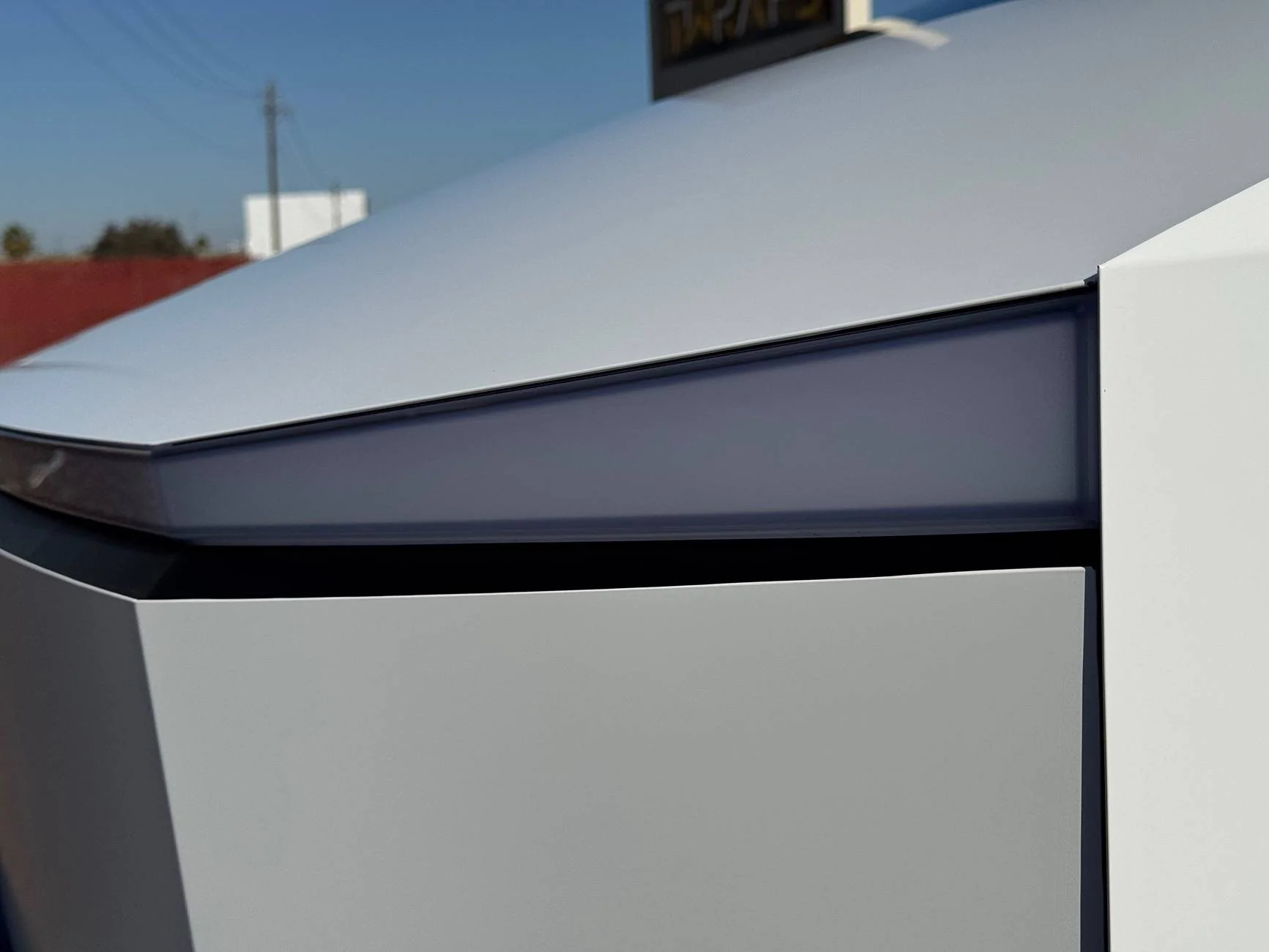 Tesla Cybertruck Cybertruck wrapped in Satin White PPF with satin pillars IMG_2256