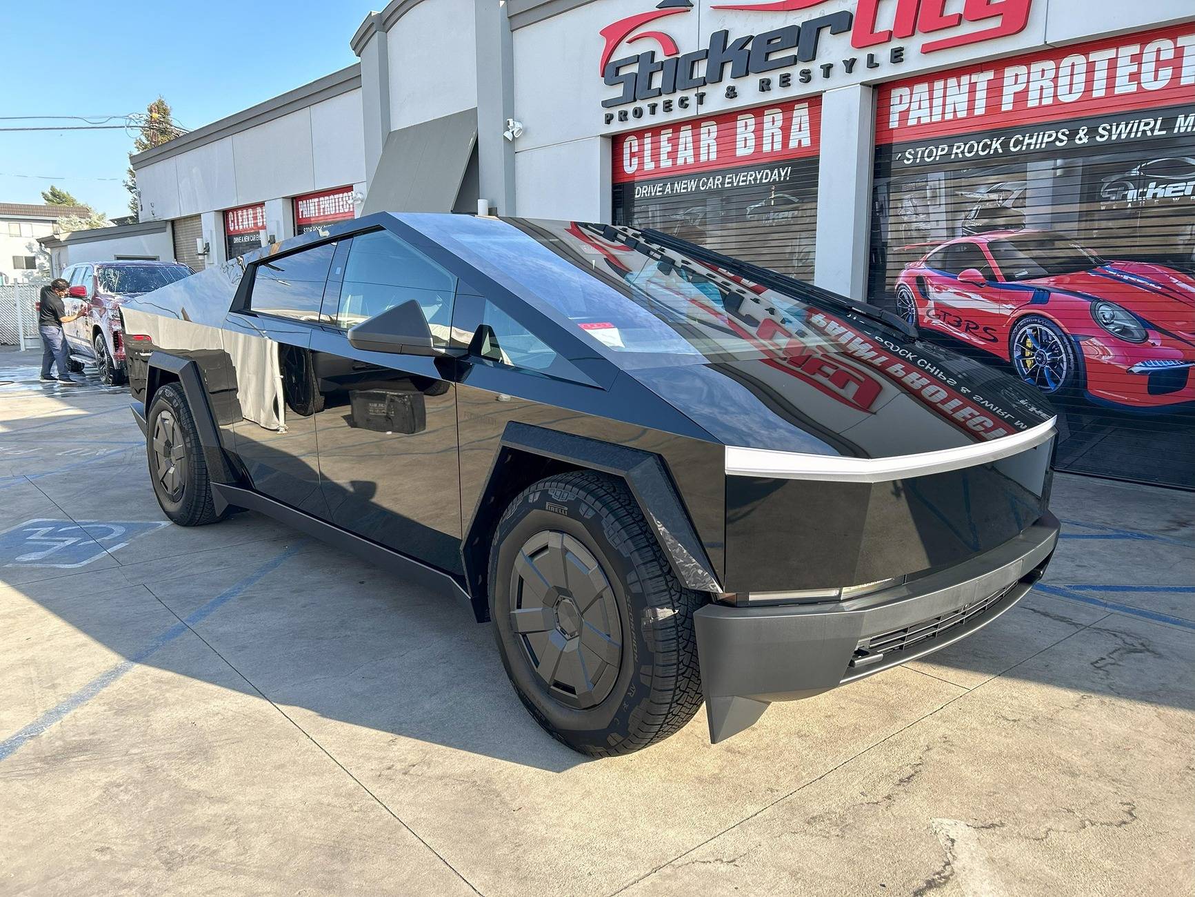 Tesla Cybertruck 🛡️ Camouflage Fenders with Gloss Black PPF?! 🖤✨ Cybertruck gloss black ppf with camo fender flares plastic wrap stickercity (1).JPG