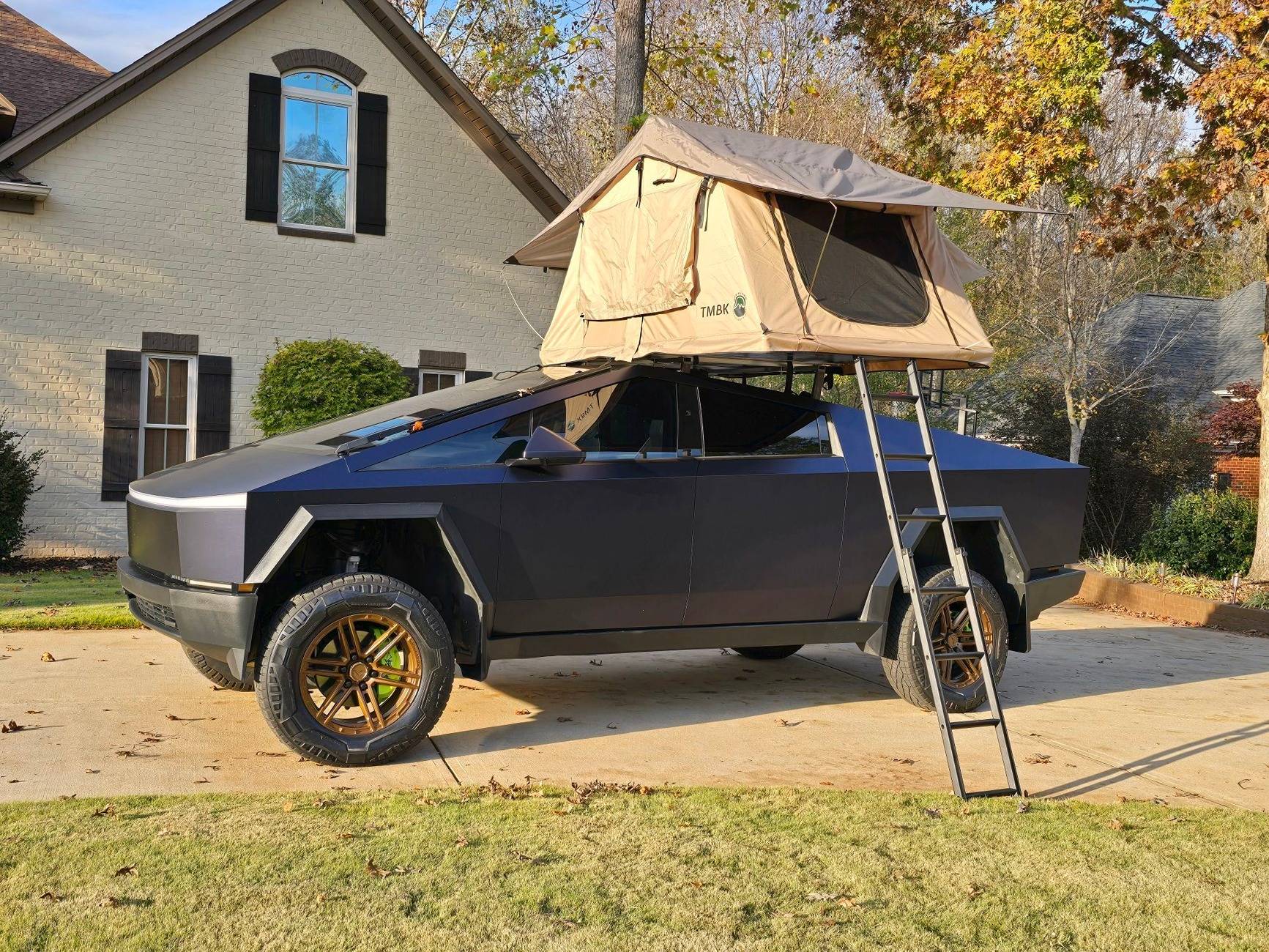 Tesla Cybertruck BLUE / BLURPLE / PURPLE Vinyl Wrap & PPF Cybertruck -- Photos & Videos Cybertruck in PWF Matt Space Mugello vinyl wrap with custom roof rack and aftermarket bronze w