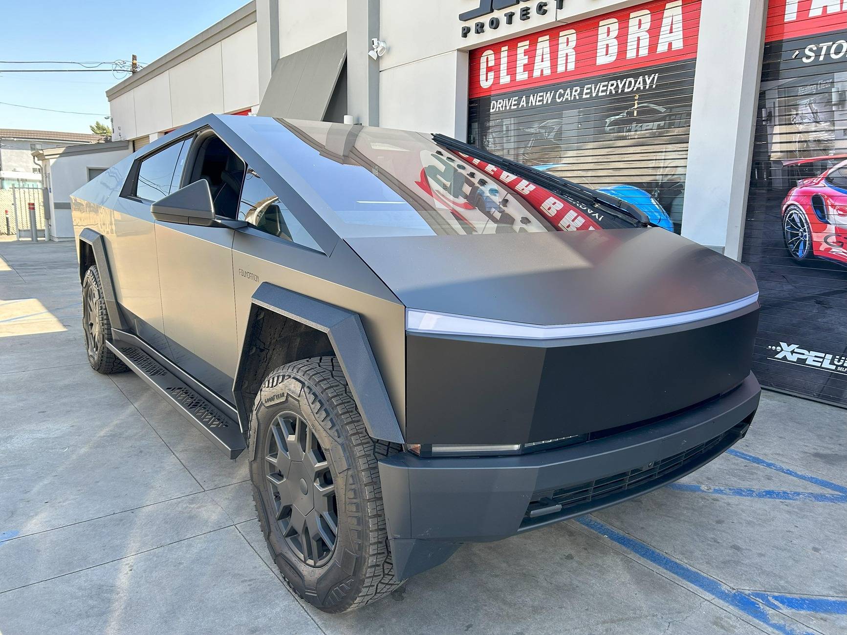Tesla Cybertruck 🖤🖤BATmobile? Satin Black with Running Boards 🖤🖤 Cybertruck Satin matte black with running boards stickercity SLiPLO STEProtect step stands acc...JPG