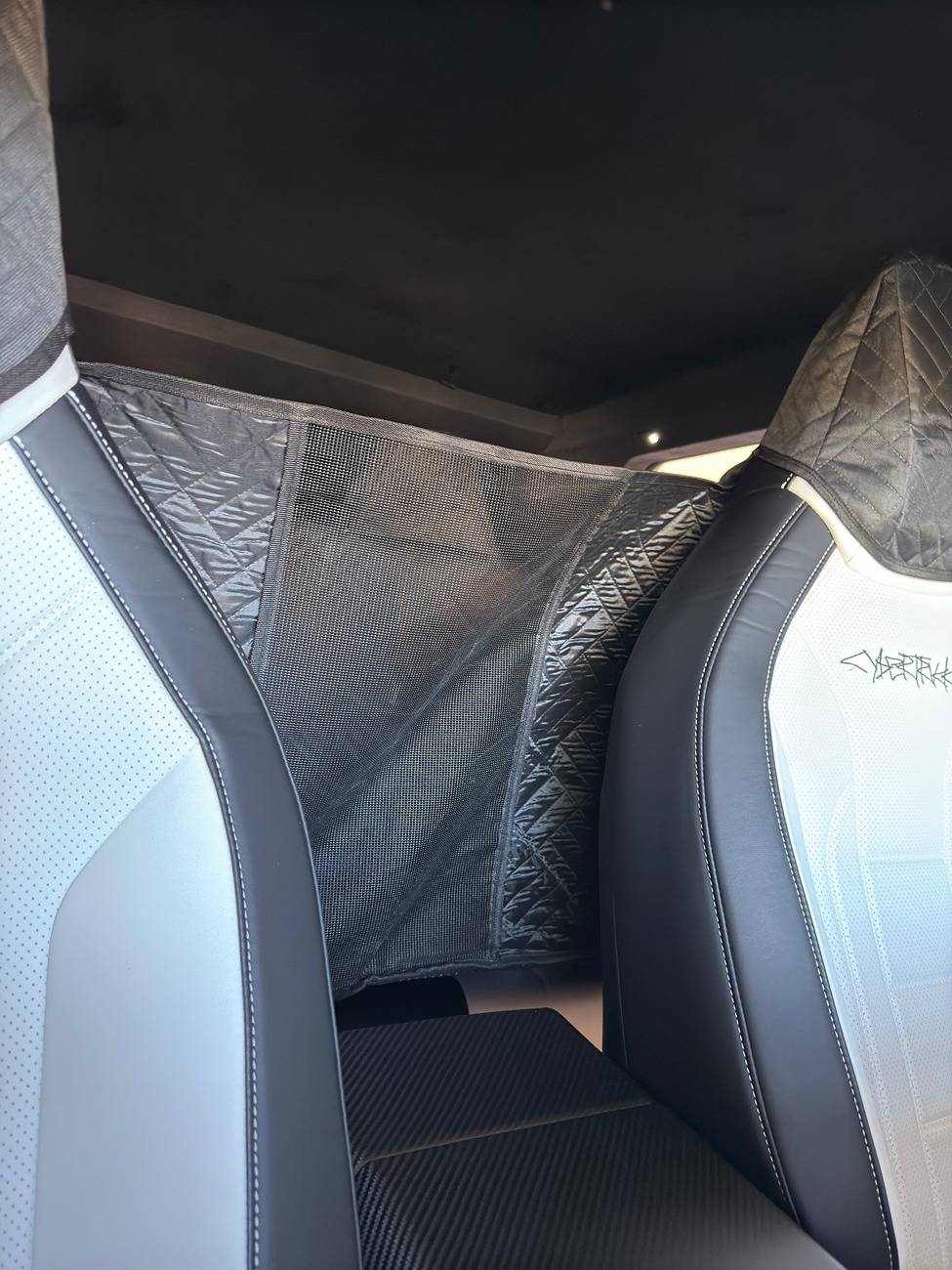 Tesla Cybertruck I installed pet mat on my Cybertruck,it really can protect your car seat dog.JPG