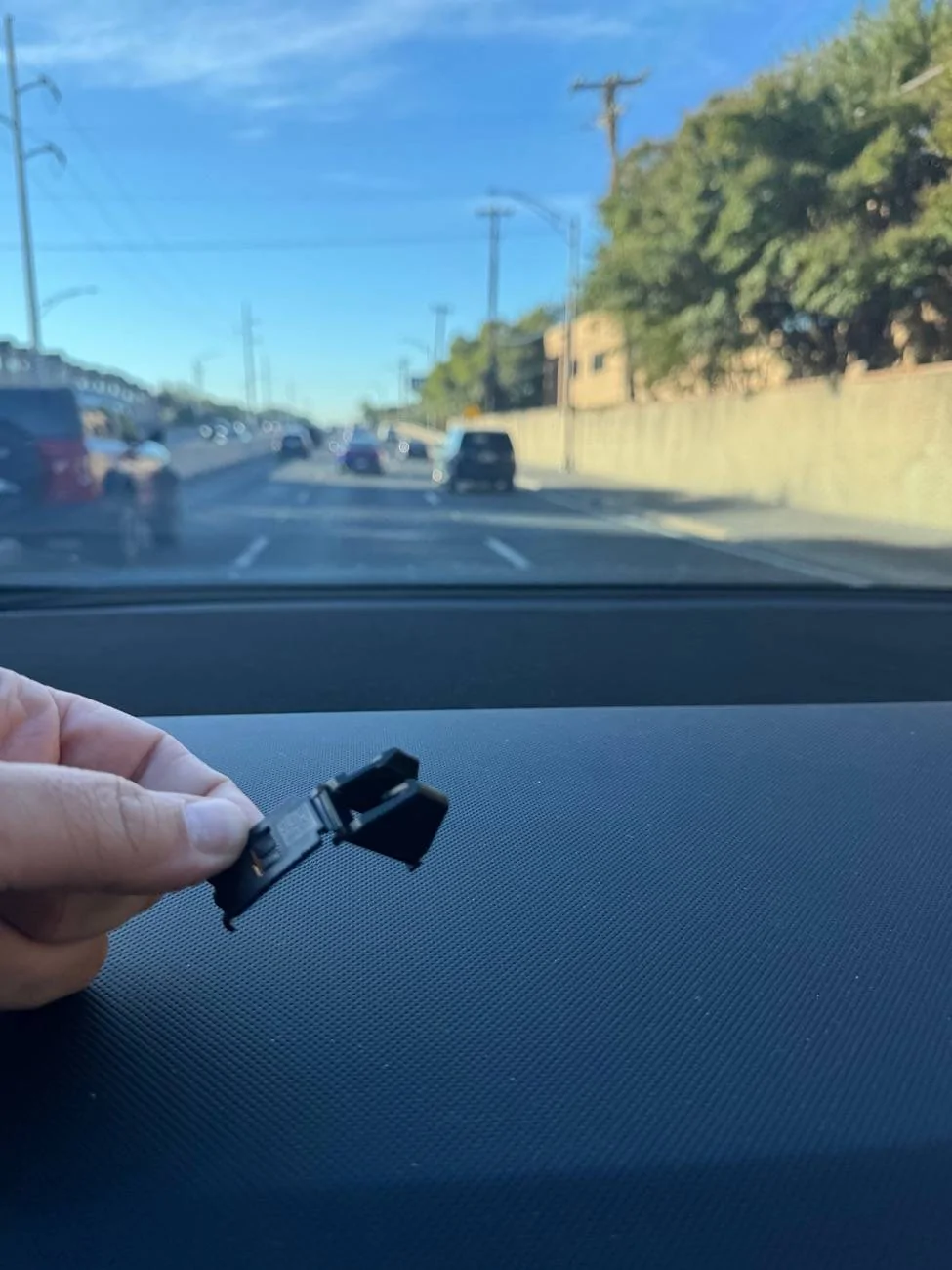 Tesla Cybertruck Small Black Plastic Piece Fell from Dash IMG_2392