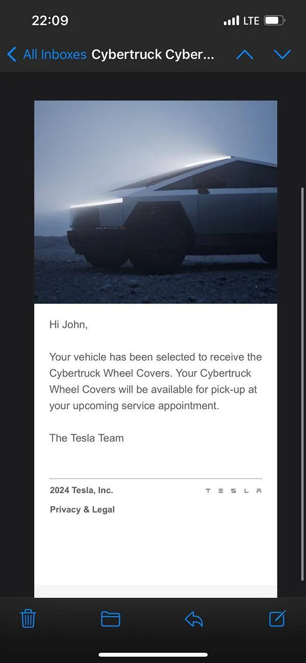 Tesla Cybertruck Bad news - front camera died; Good news - will get wheel covers at service appointment IMG_8522