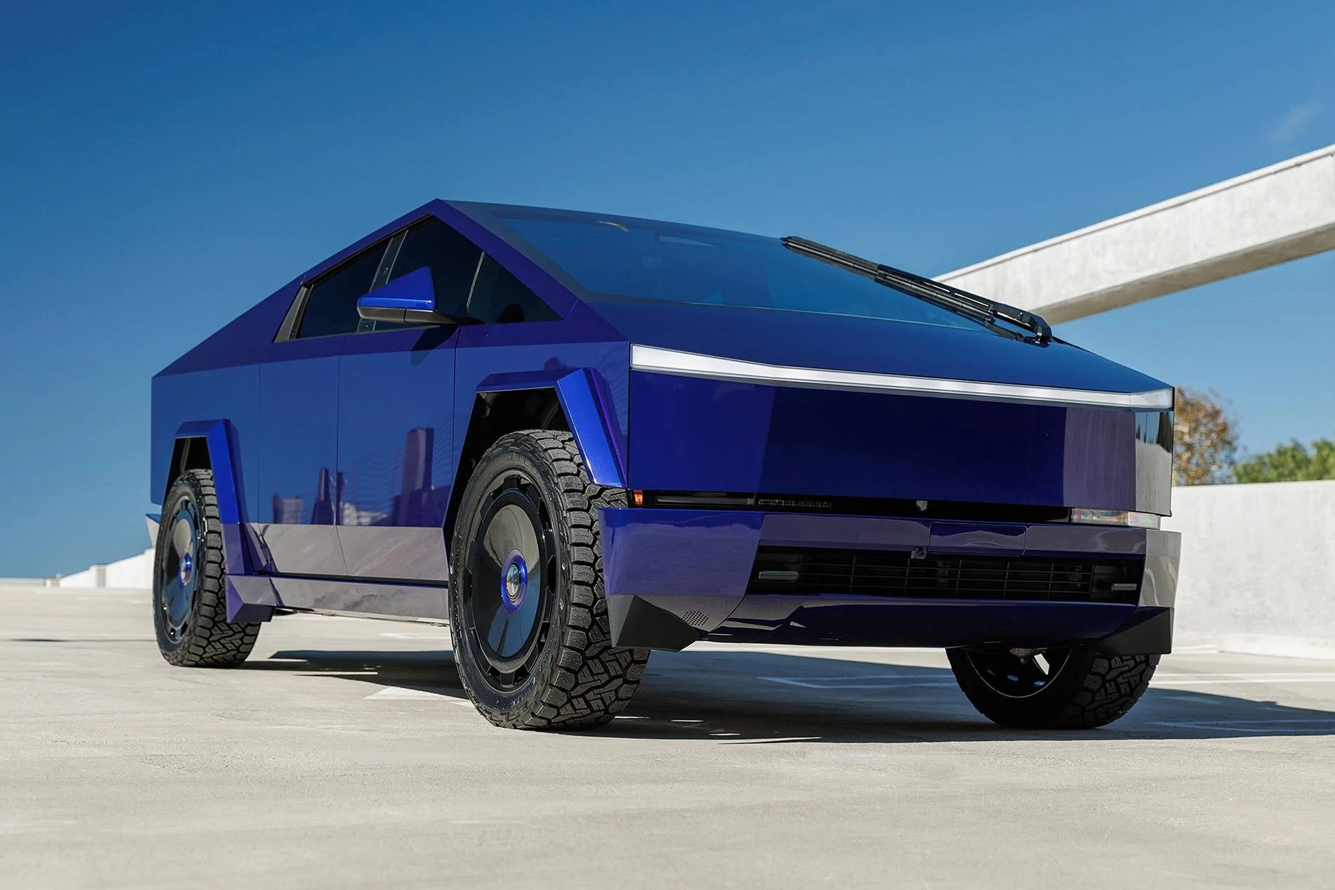 Tesla Cybertruck Cybertruck Aftermarket Wheels & Tires Photos + Info Compilation xtmaxx-metallic-electric-blue-tesla-cybertruck-24-ctm-wheels-gloss-black-19-1