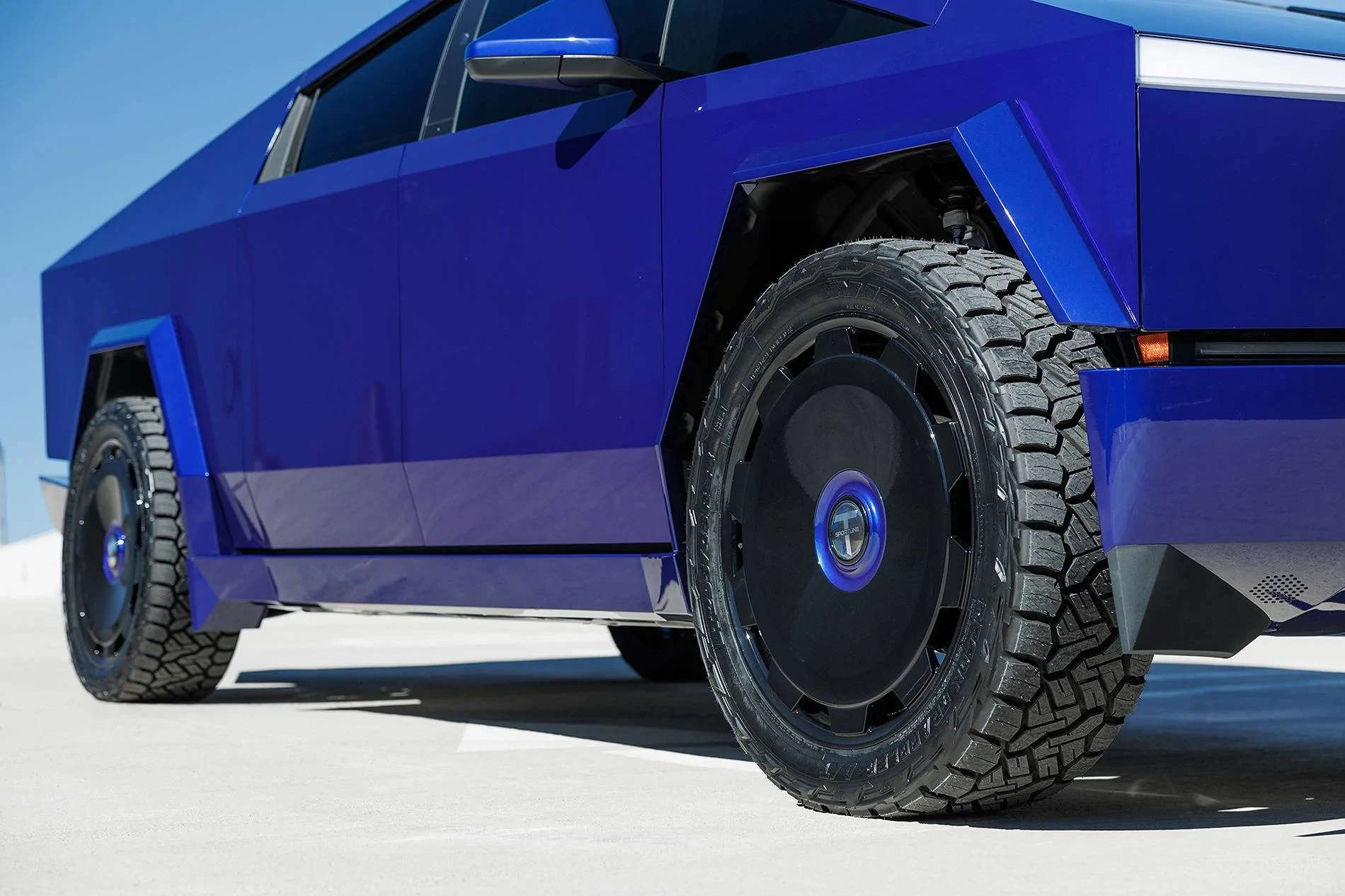 Tesla Cybertruck Cybertruck Aftermarket Wheels & Tires Photos + Info Compilation tmaxx-metallic-electric-blue-tesla-cybertruck-24-ctm-wheels-gloss-black-19-7