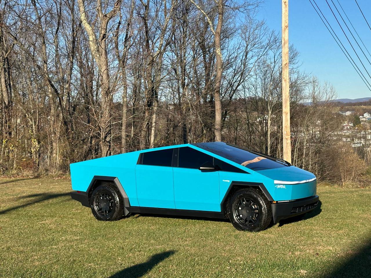 Tesla Cybertruck Project complete: Miami Blue Cybertruck 1000014097