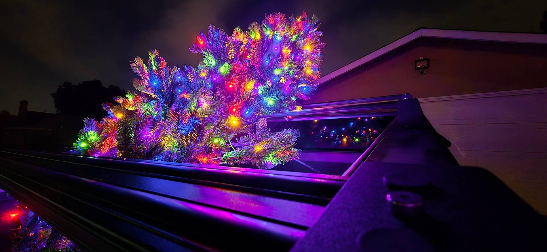 Tesla Cybertruck Lit up Christmas Tree in Cyberbeast Bed 20241118_212618