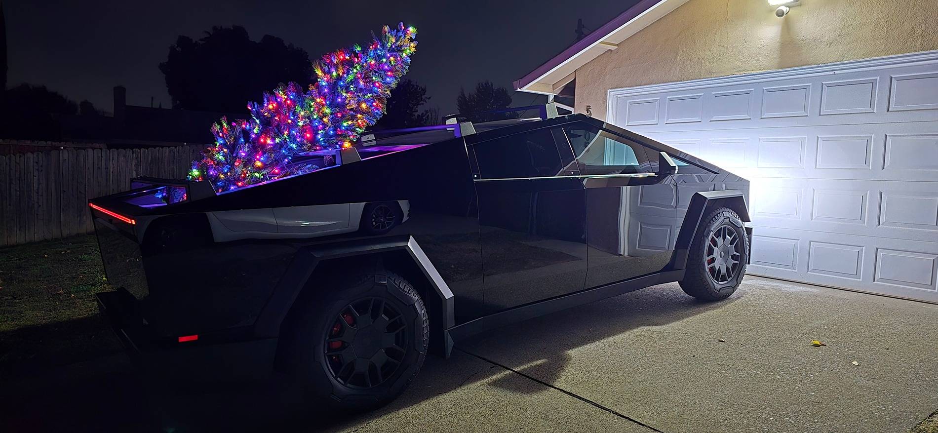 Tesla Cybertruck Lit up Christmas Tree in Cyberbeast Bed 20241118_212313