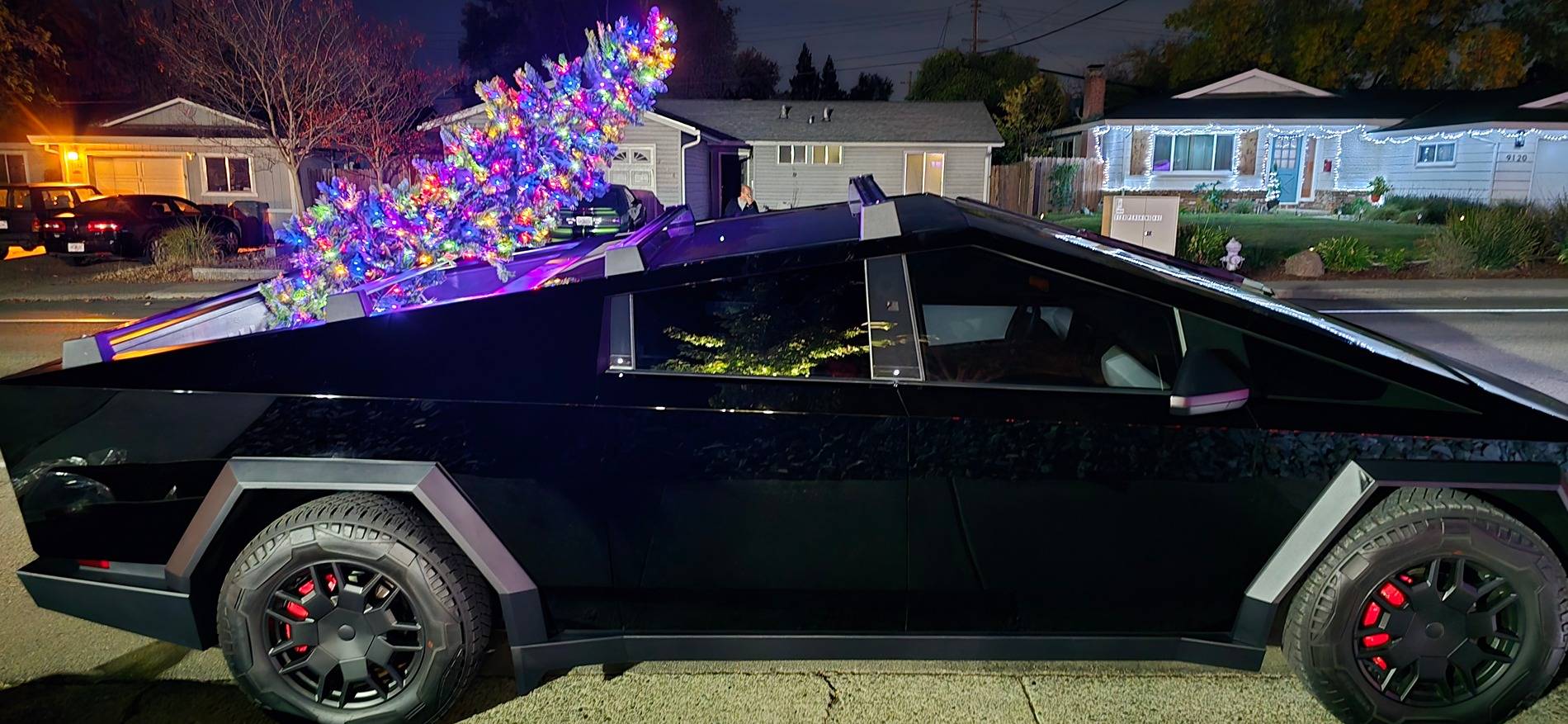 Tesla Cybertruck Lit up Christmas Tree in Cyberbeast Bed 20241118_202659