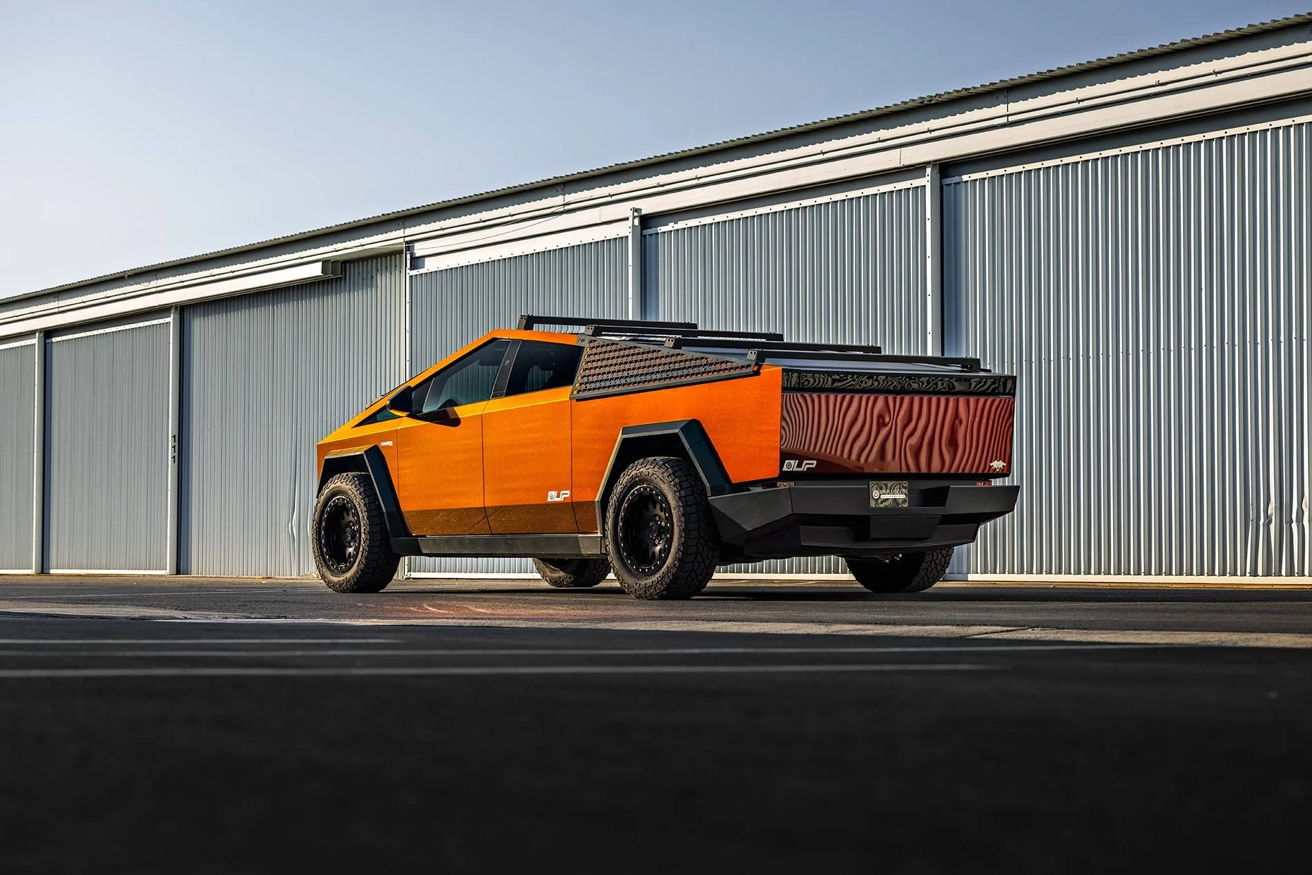 Tesla Cybertruck Customer Highlight - Assassin Red Cybertruck Build Tesla Cybertruck Assassin Red Wrap 20 inch Beadlock UP-03 Forged Wheels Roof Rails MOLLE Pan