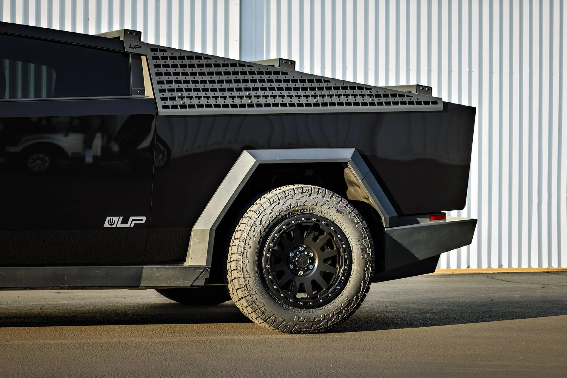 Tesla Cybertruck Customer Highlight - Assassin Red Cybertruck Build Tesla Cybertruck Assassin Red Wrap 20 inch Beadlock UP-03 Forged Wheels Roof Rails MOLLE Pan